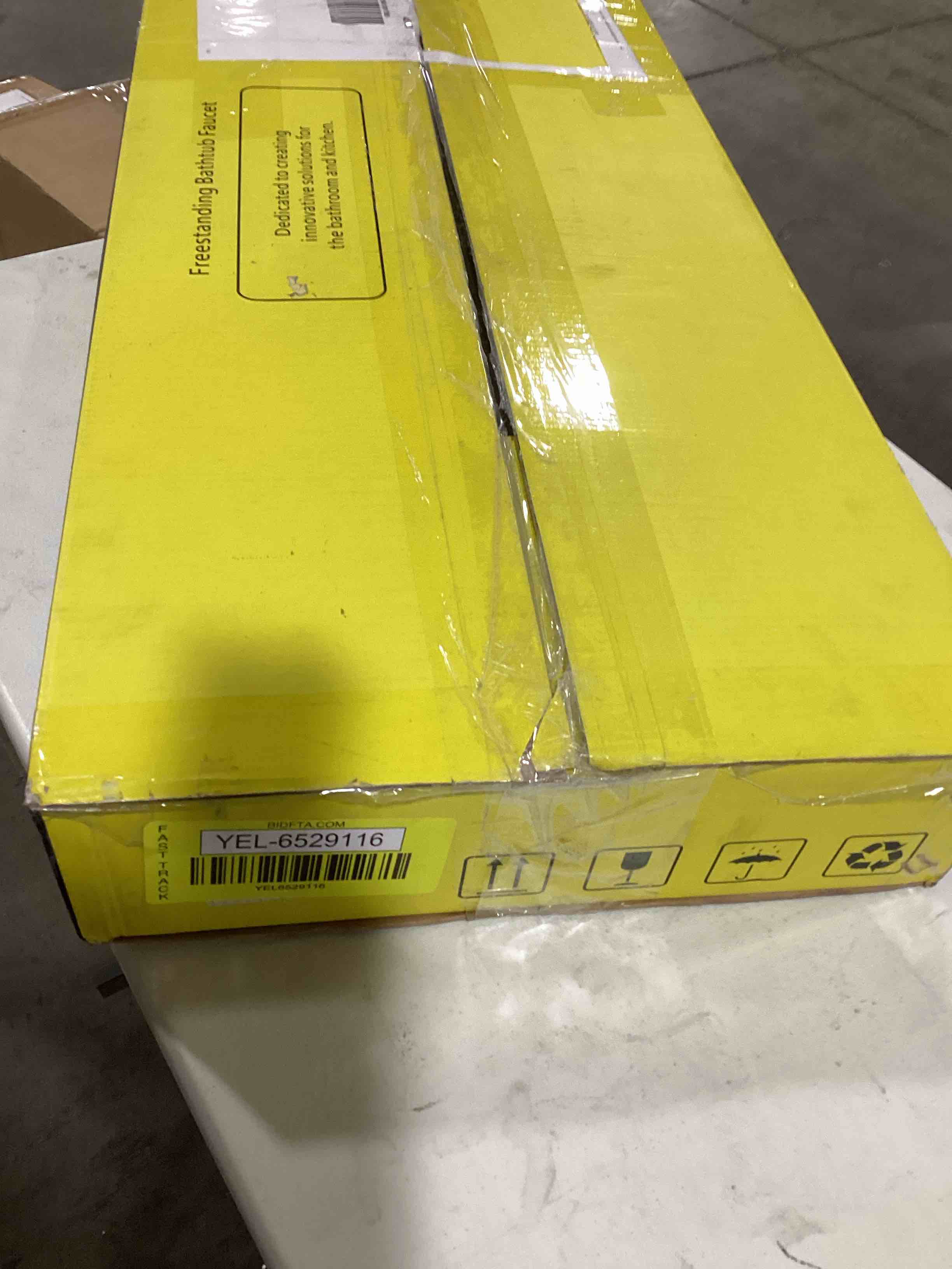 https://s3.amazonaws.com/lotting-images-prod/bidfta/YEL6529116_1719944775167.jpeg