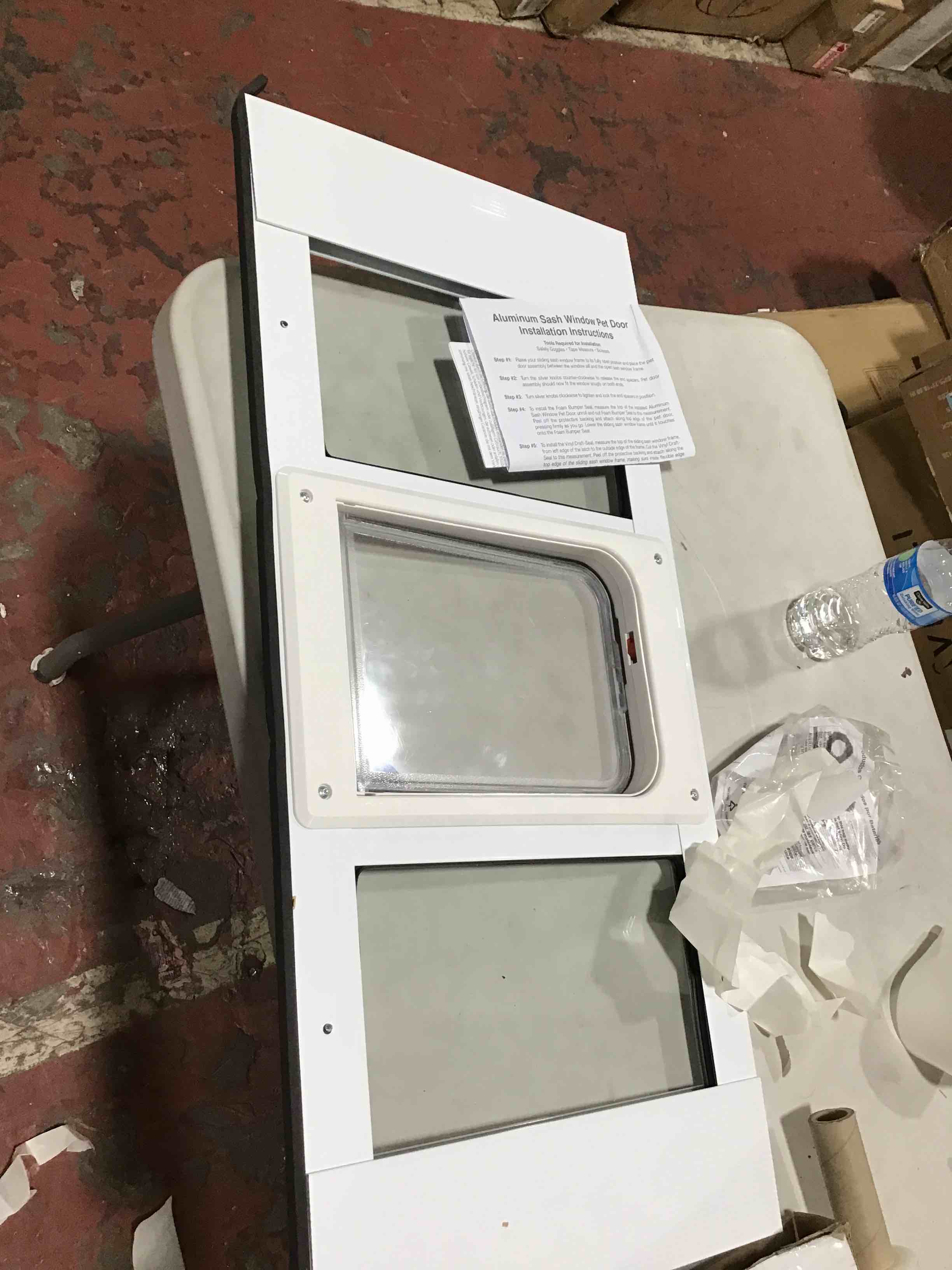 Ideal Pet Products Aluminum Sash Window Pet Door, Adjustable Width 33