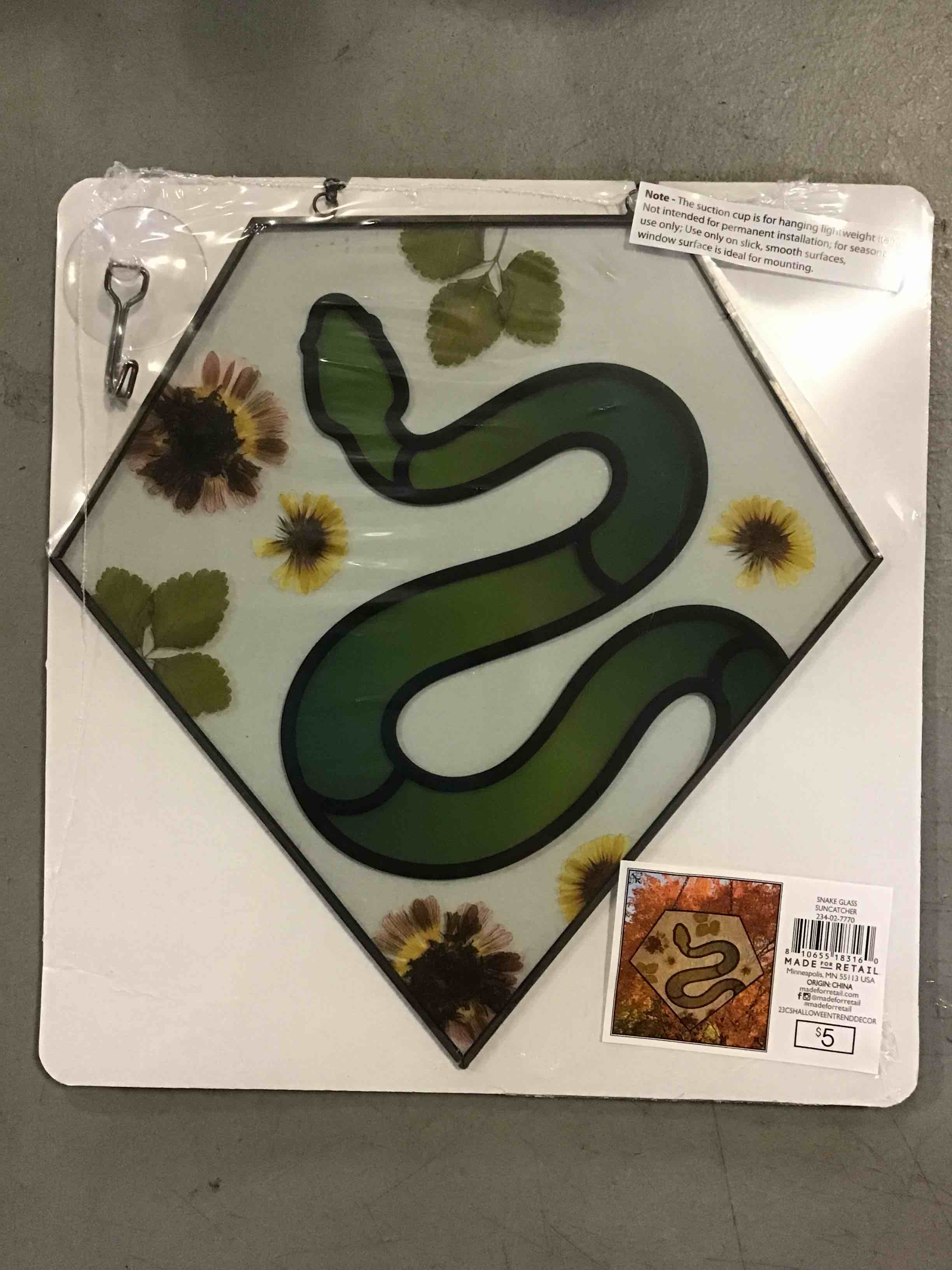 Bull’s-eye playground Snake  skull glass suncatcher
