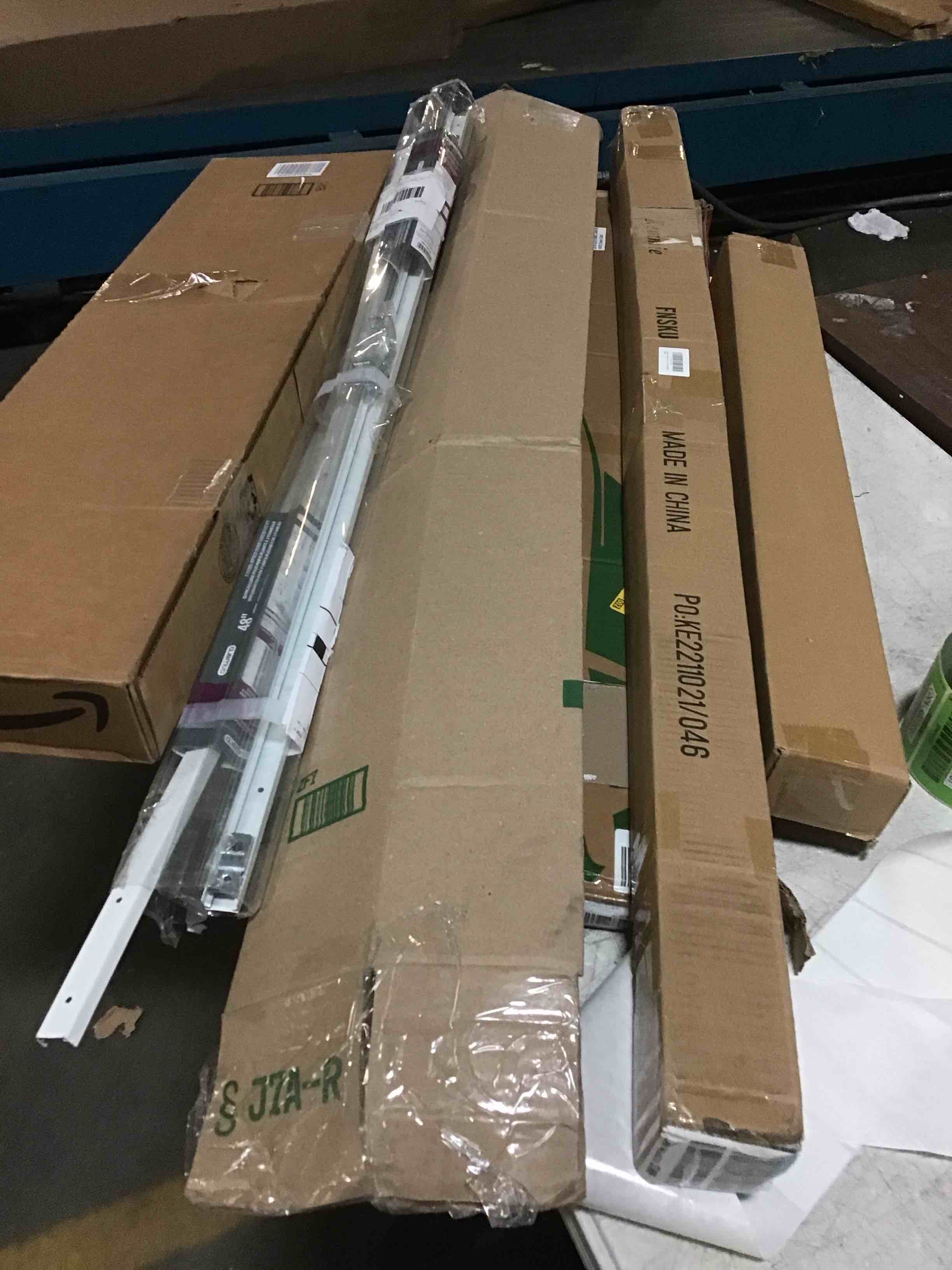 Assortment of Miscellaneous products (May Include cordless shade, curtain rods, retractable baby gate, Led universal linear lamp and more or other use)