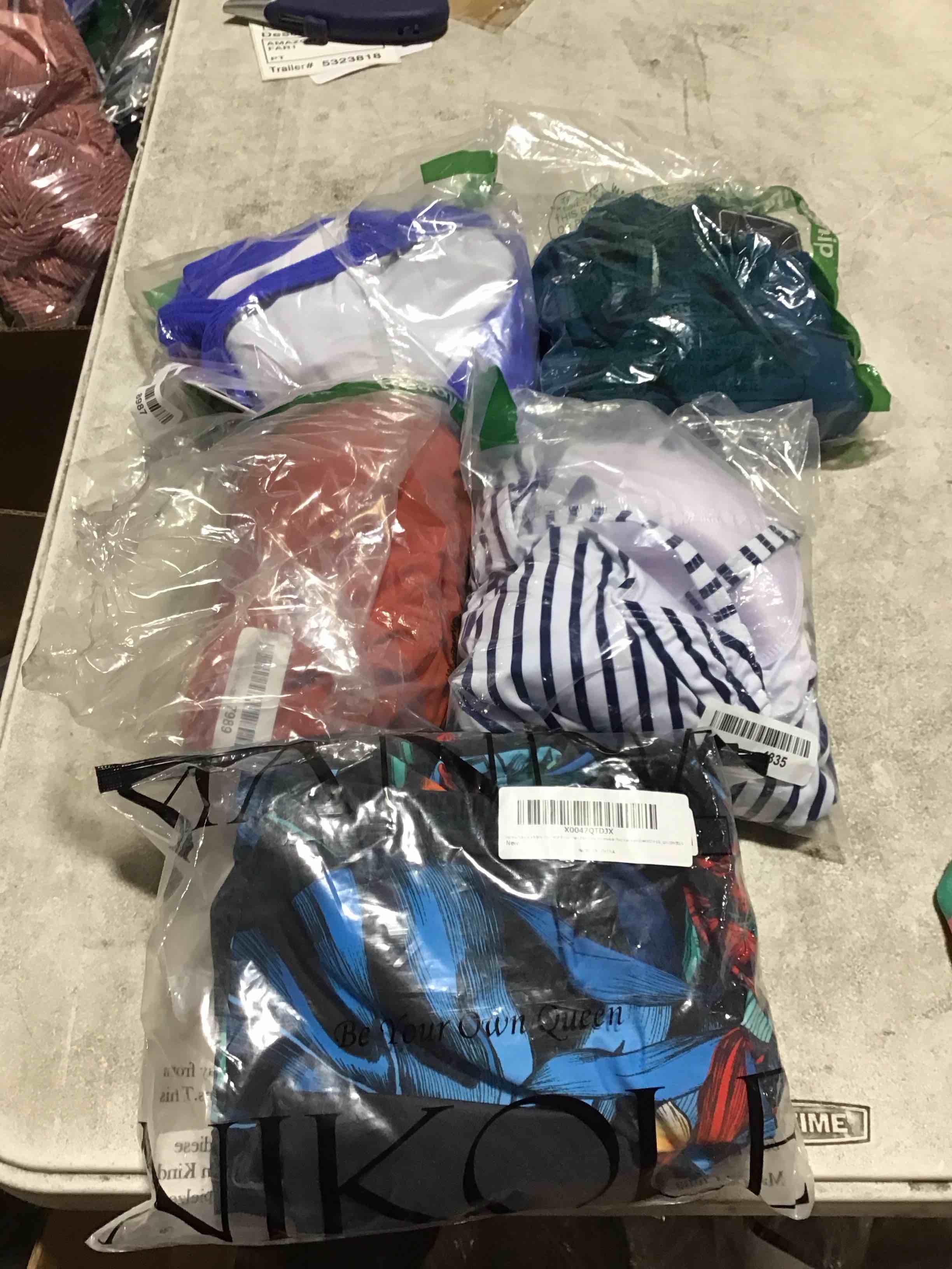 Assorted Bathing Suits For Men And Women ( Styles And Sizes May Vary ) 