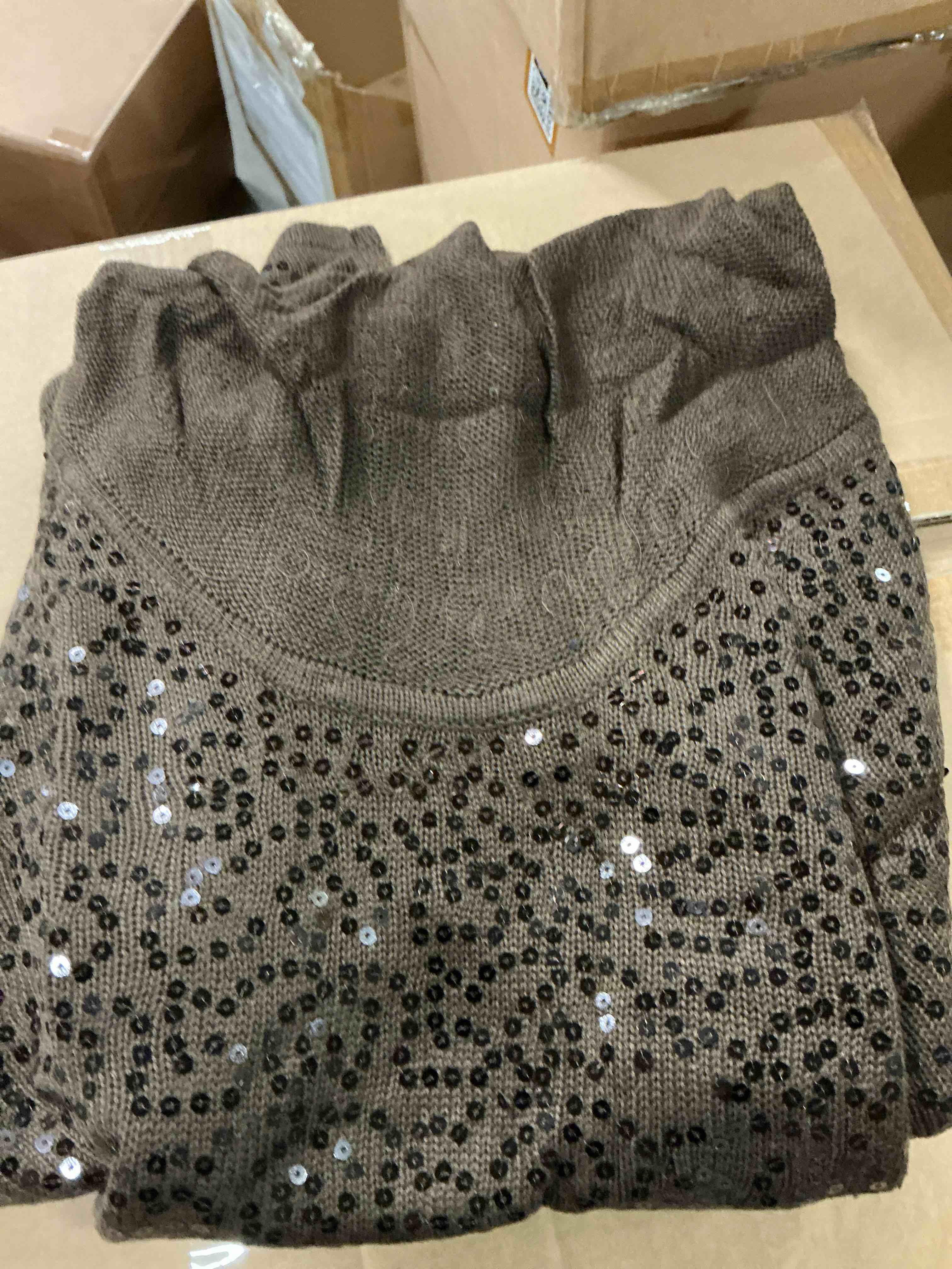 Assortment of shirts of different styles and sizes and colors (1 box gets 14 pieces)