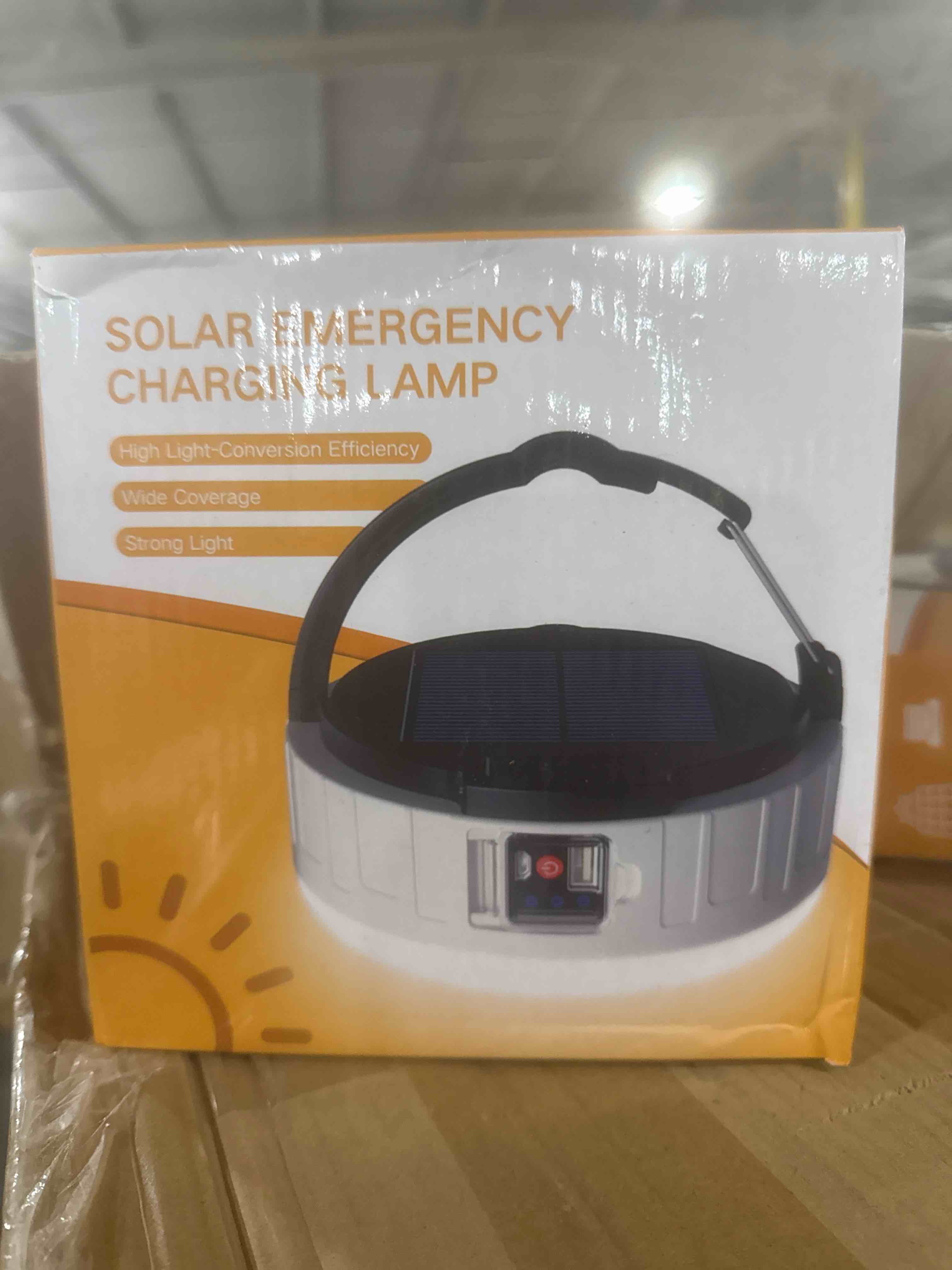 solar emergency charging lamp 