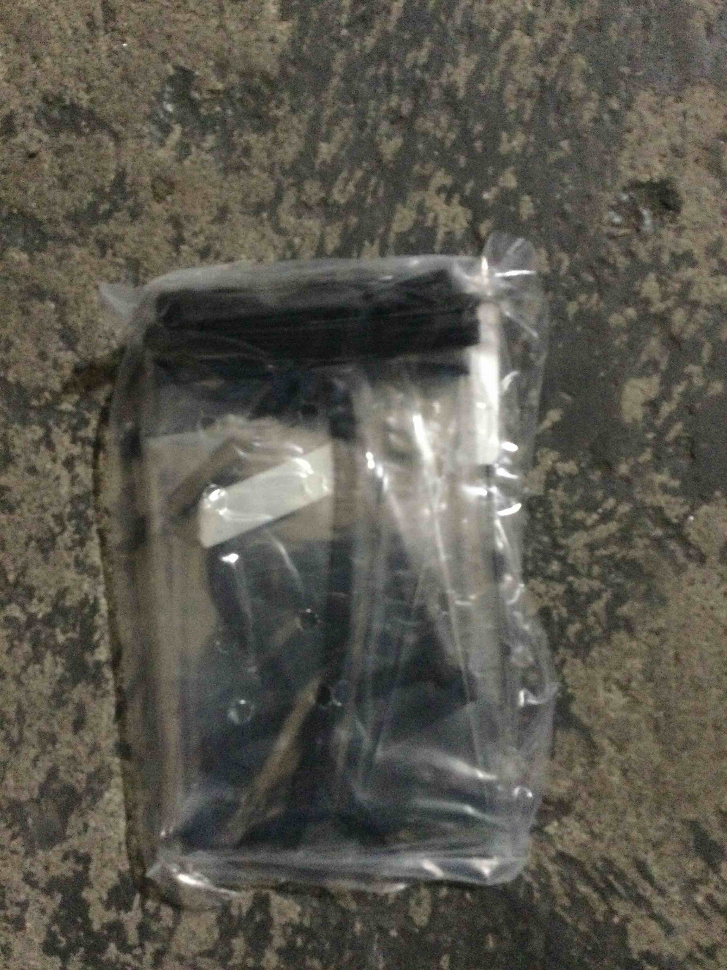 small black and clear garment bag 