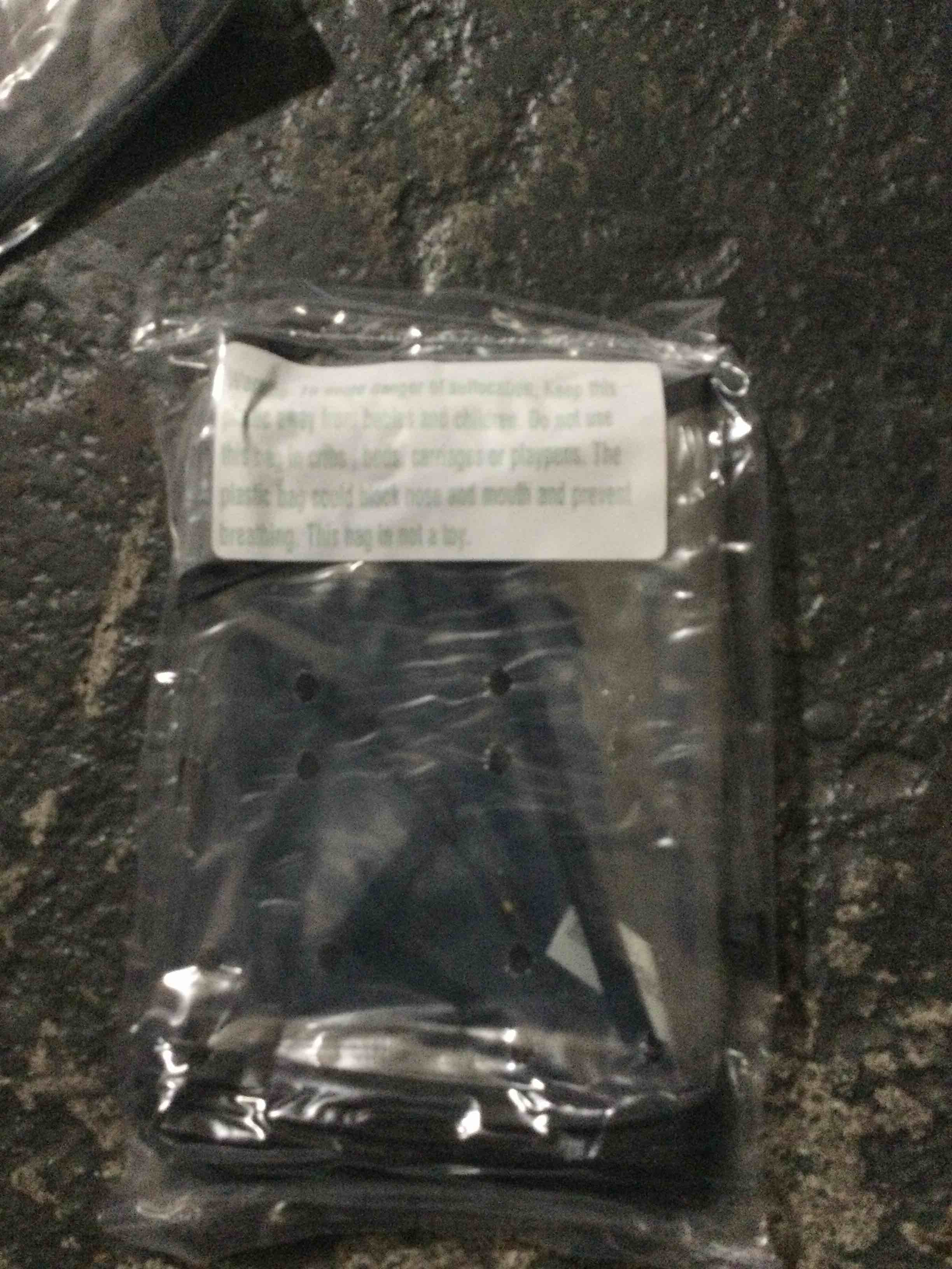 small black and clear garment bag 