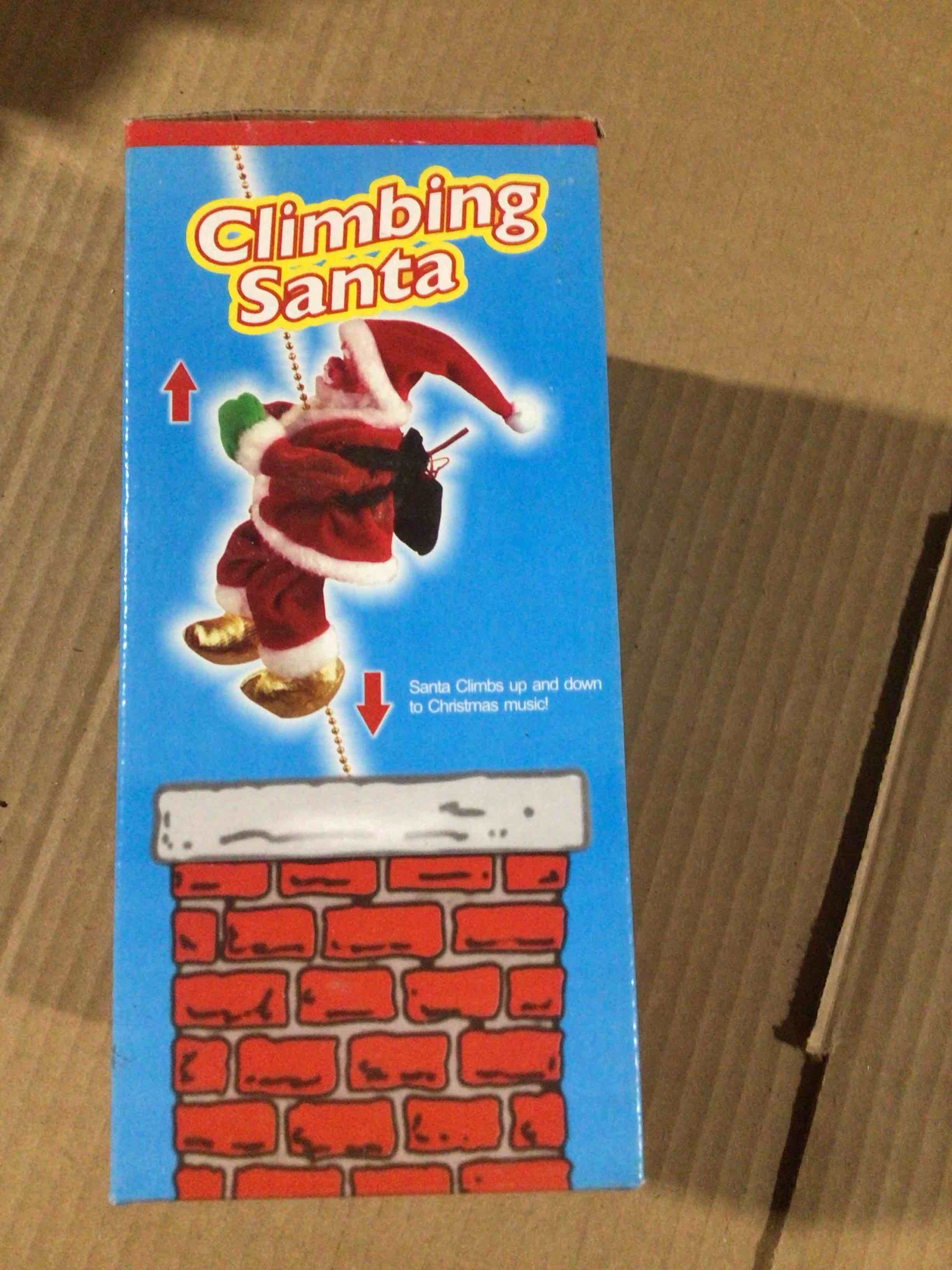 Toys of climbing Santa , Santa climbs up and down to Christmas music 