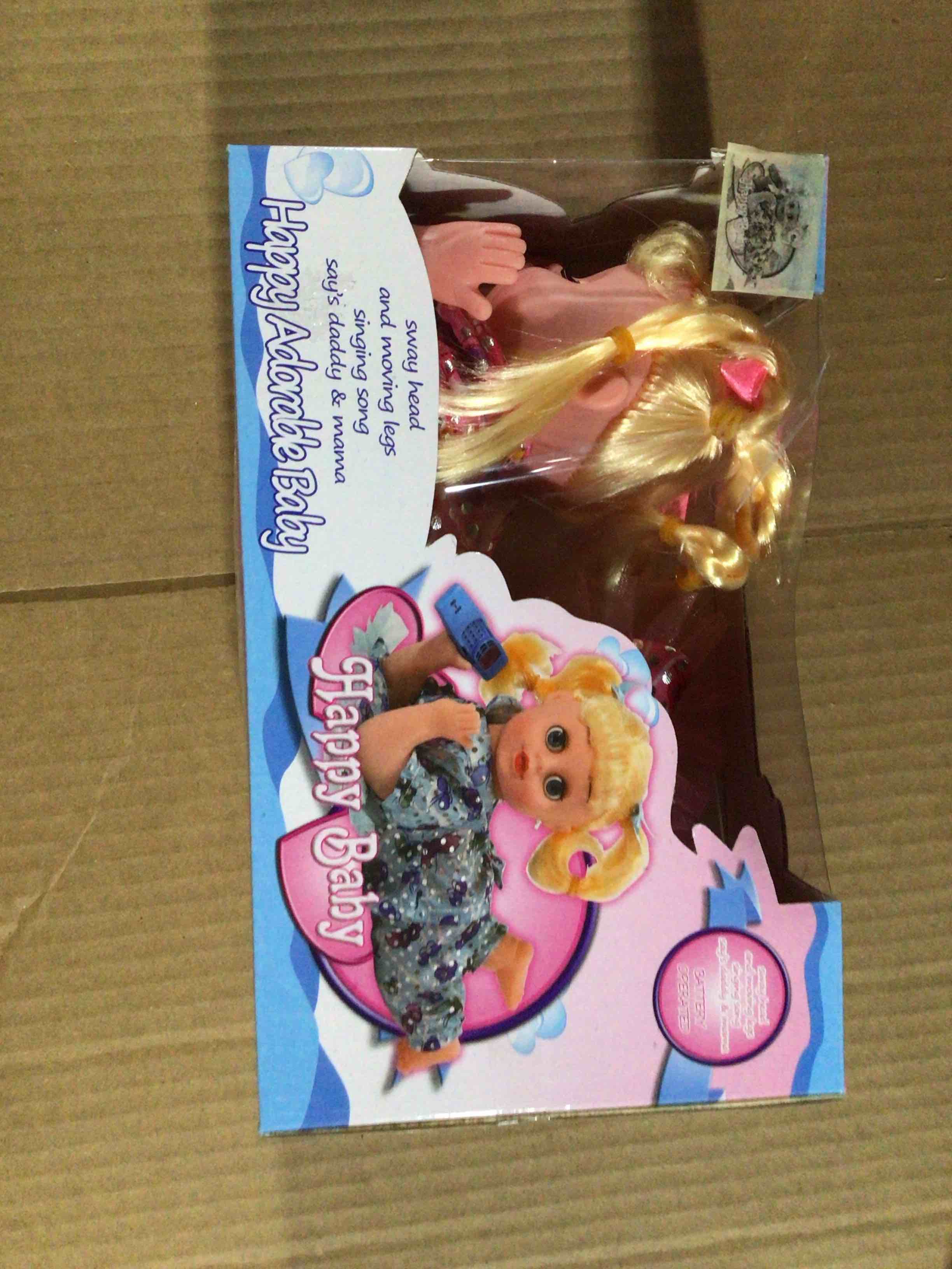 Toy doll from the “ happy Adorable baby “ line. 