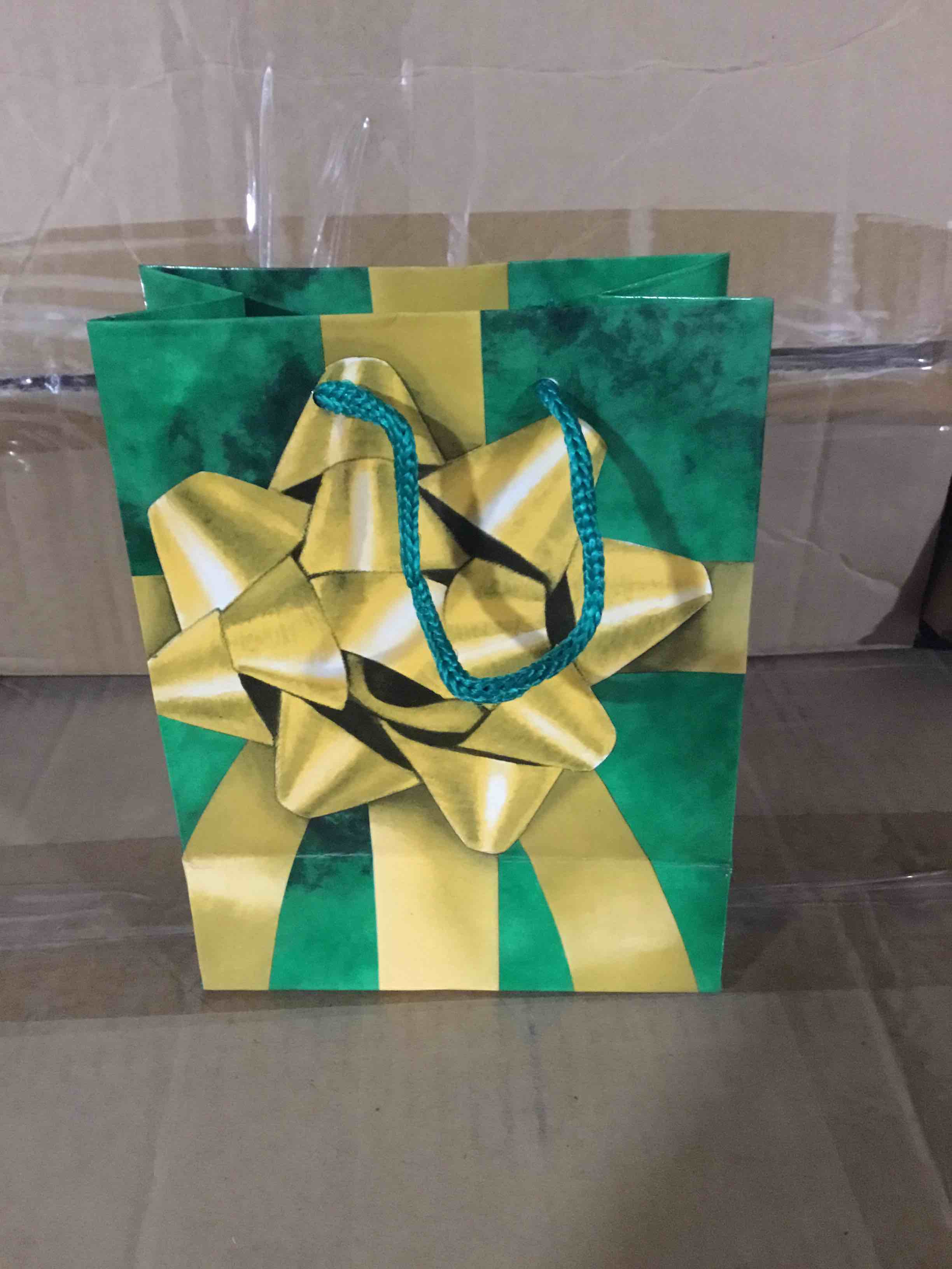 Box of 276 Small Green Gift Bags with yellow Ribbons