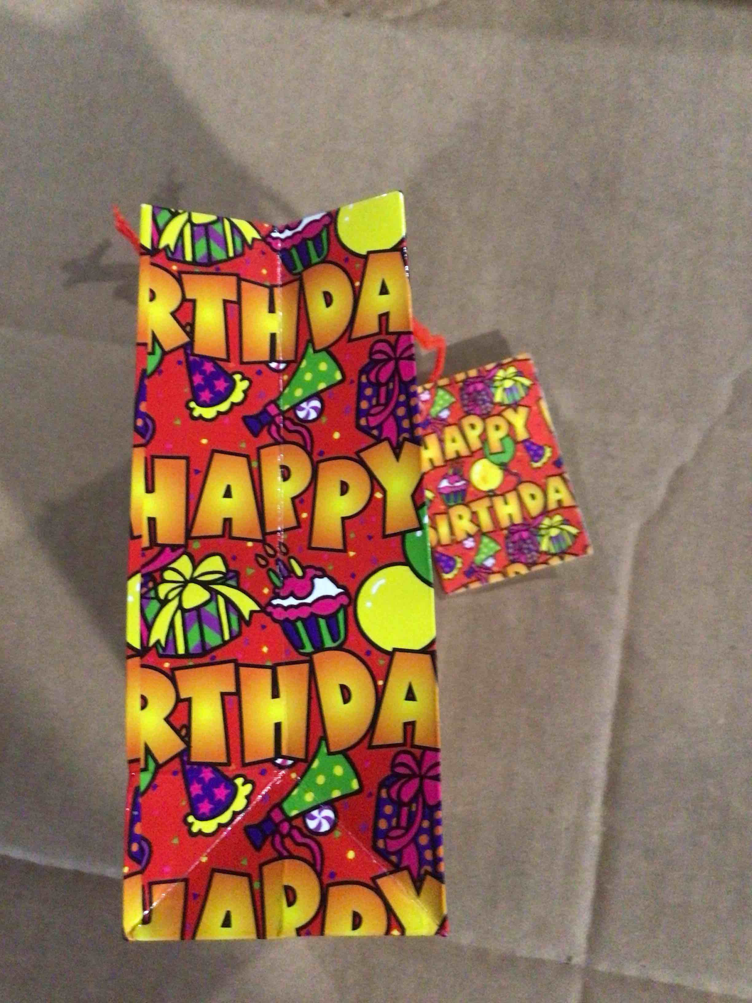 Small red gift bag with the phrase happy birthday 