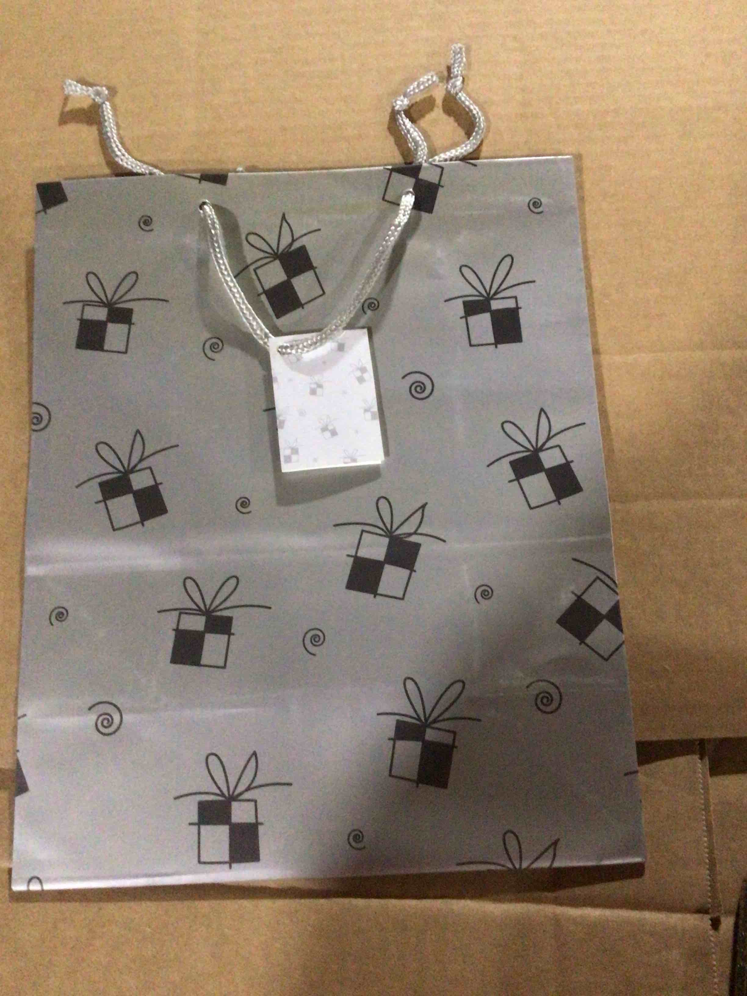 Gray and white checkered gift boxes w bows ,and gray spirals.