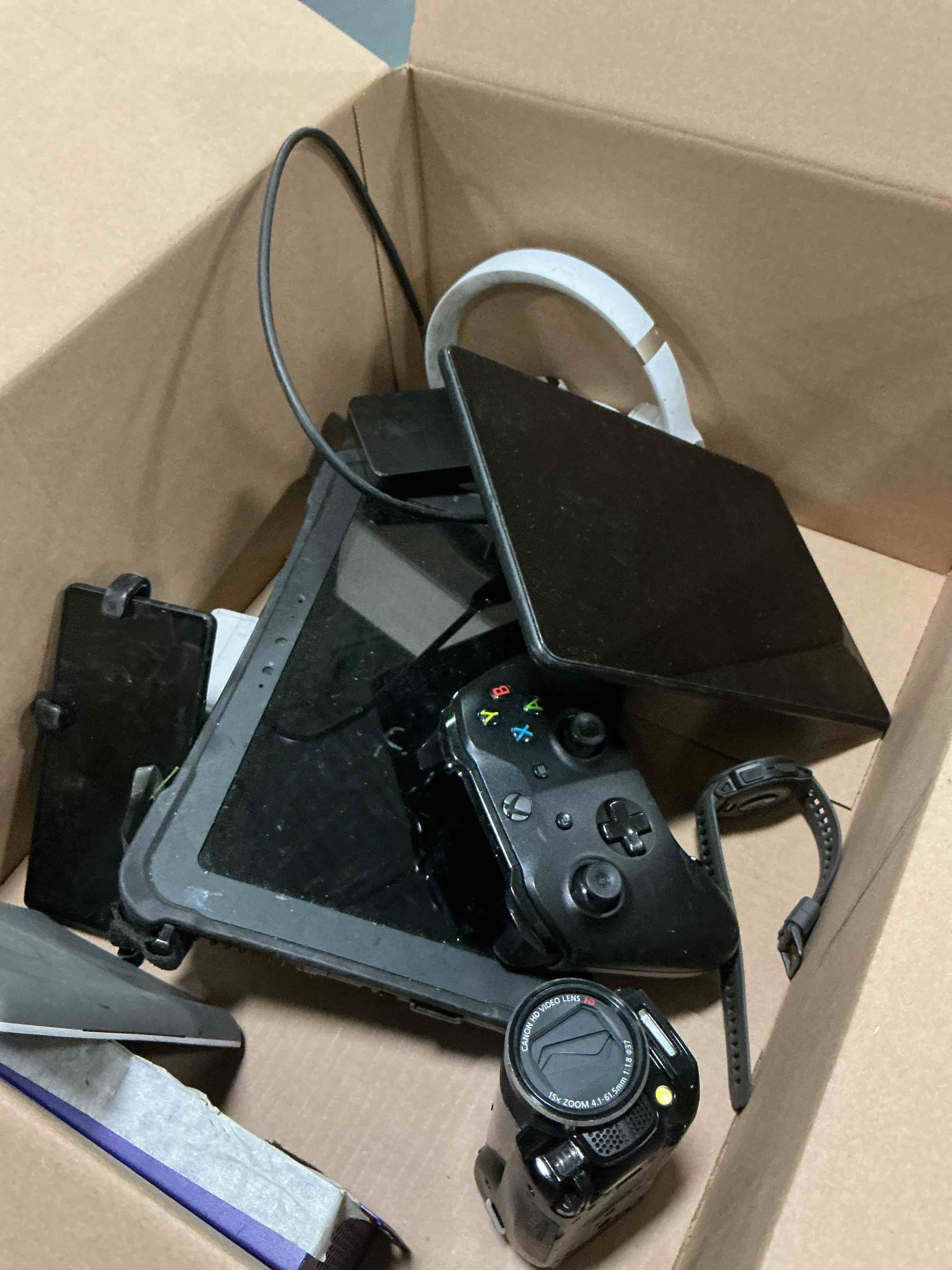 Condition photo showing As Is for Assorted Lot of Electronics (Headphones, Small Gadgets, tablets , etc.) 