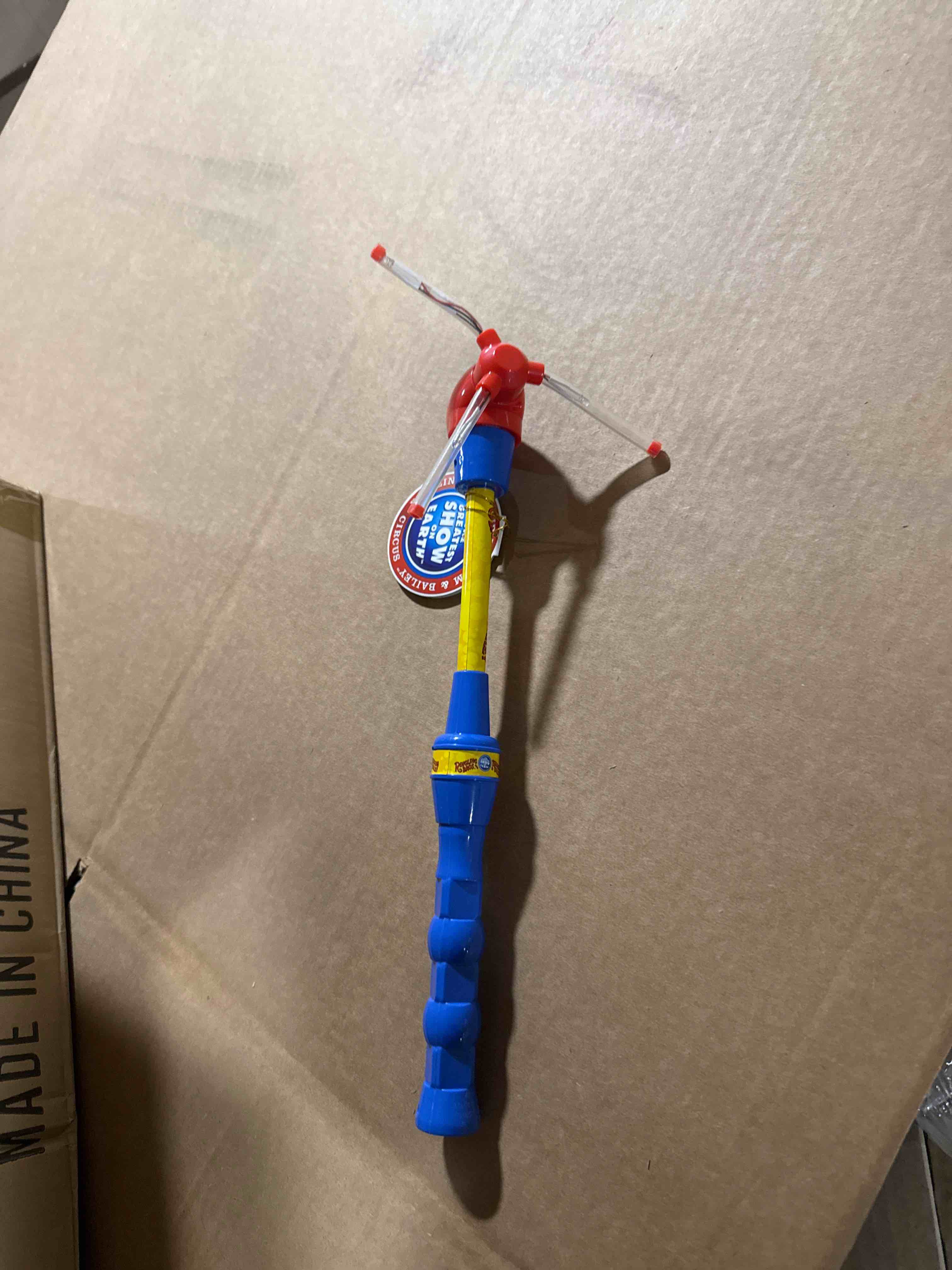 Condition photo showing Brand New for case of 24 ringling brothers lighted spinners 