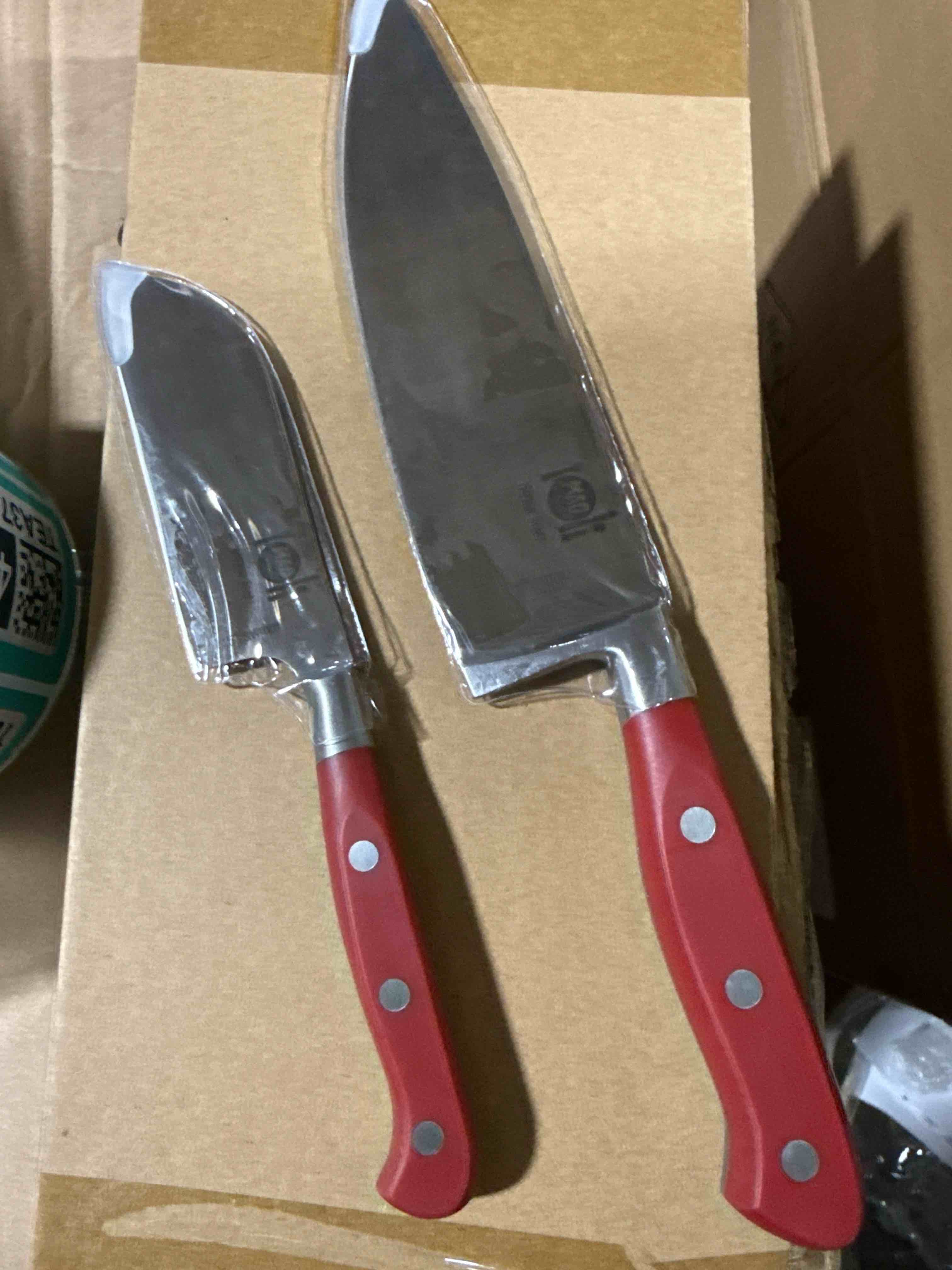Condition photo showing New/Like New for mad hungry 2-piece German steel knife set 