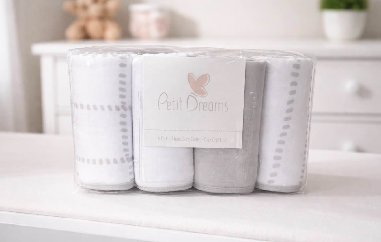 Condition photo showing New/Like New for Petit Dreams 4 Pack Fleece Burp Cloth 