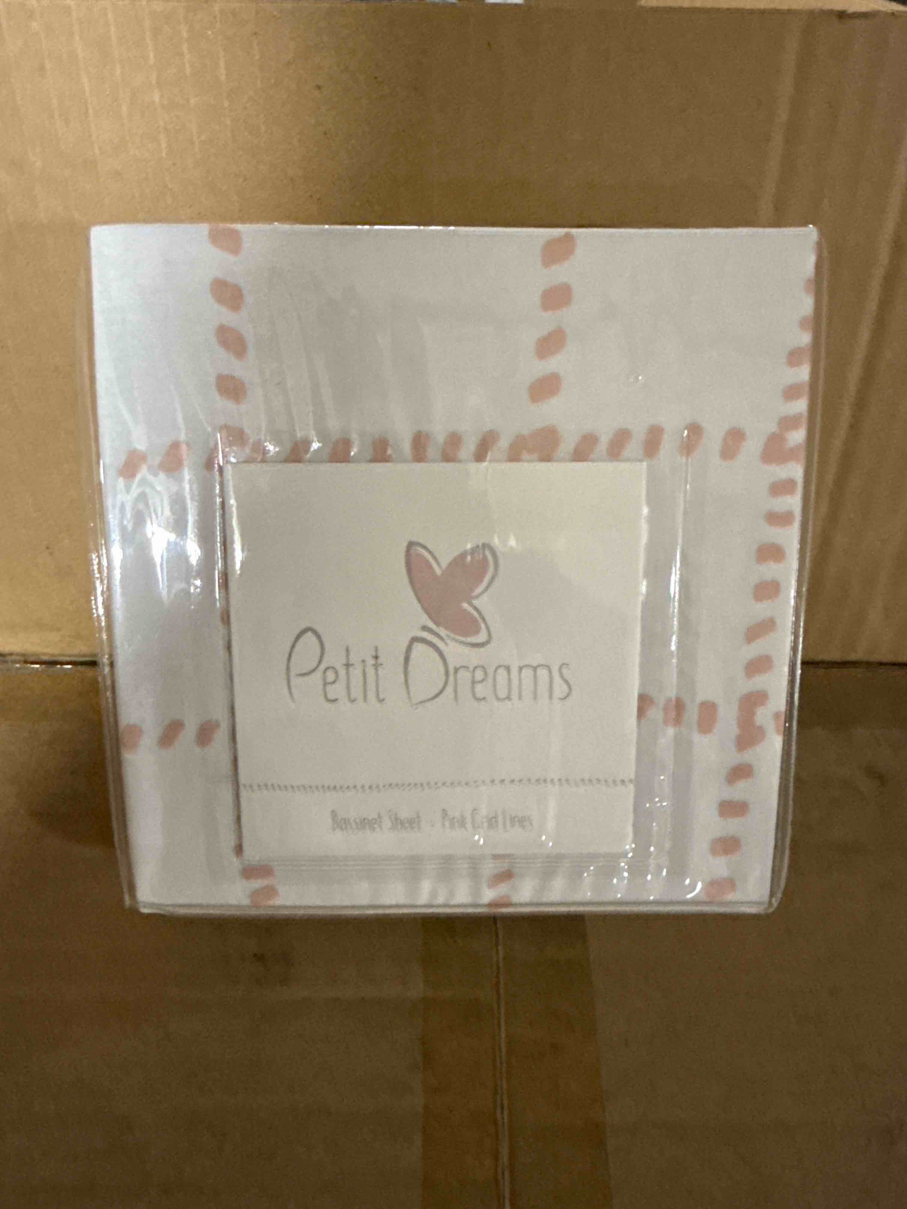 Condition photo showing New/Like New for Petit Dreams Bassinet Sheet Pink Grid Lines