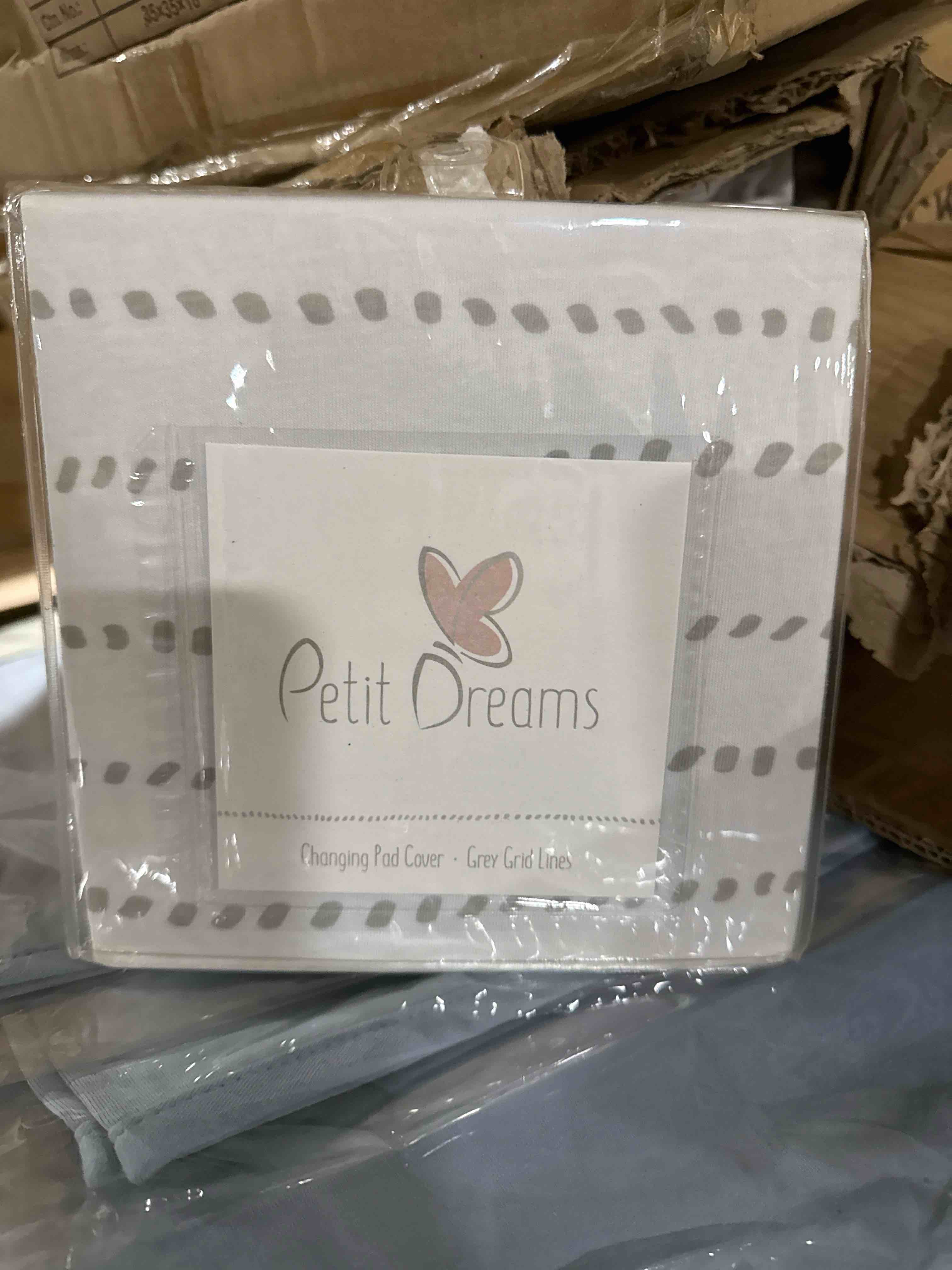 Condition photo showing New/Like New for Petit Dreams Changing Pad Cover Grey Grid Lines 