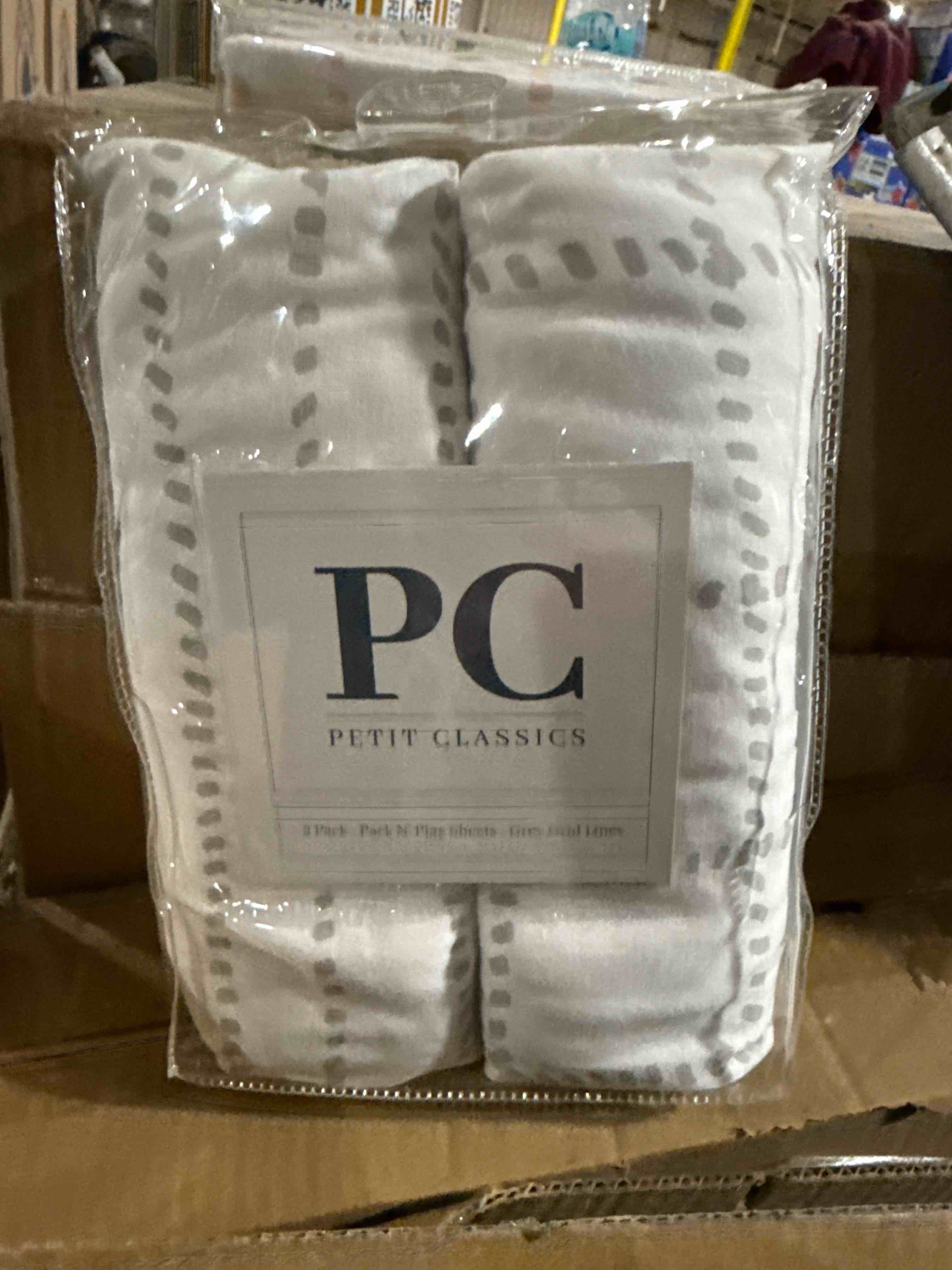 Condition photo showing New/Like New for Petit Classics 2 Pack Pack N Play Sheets Grey Grid Lines 