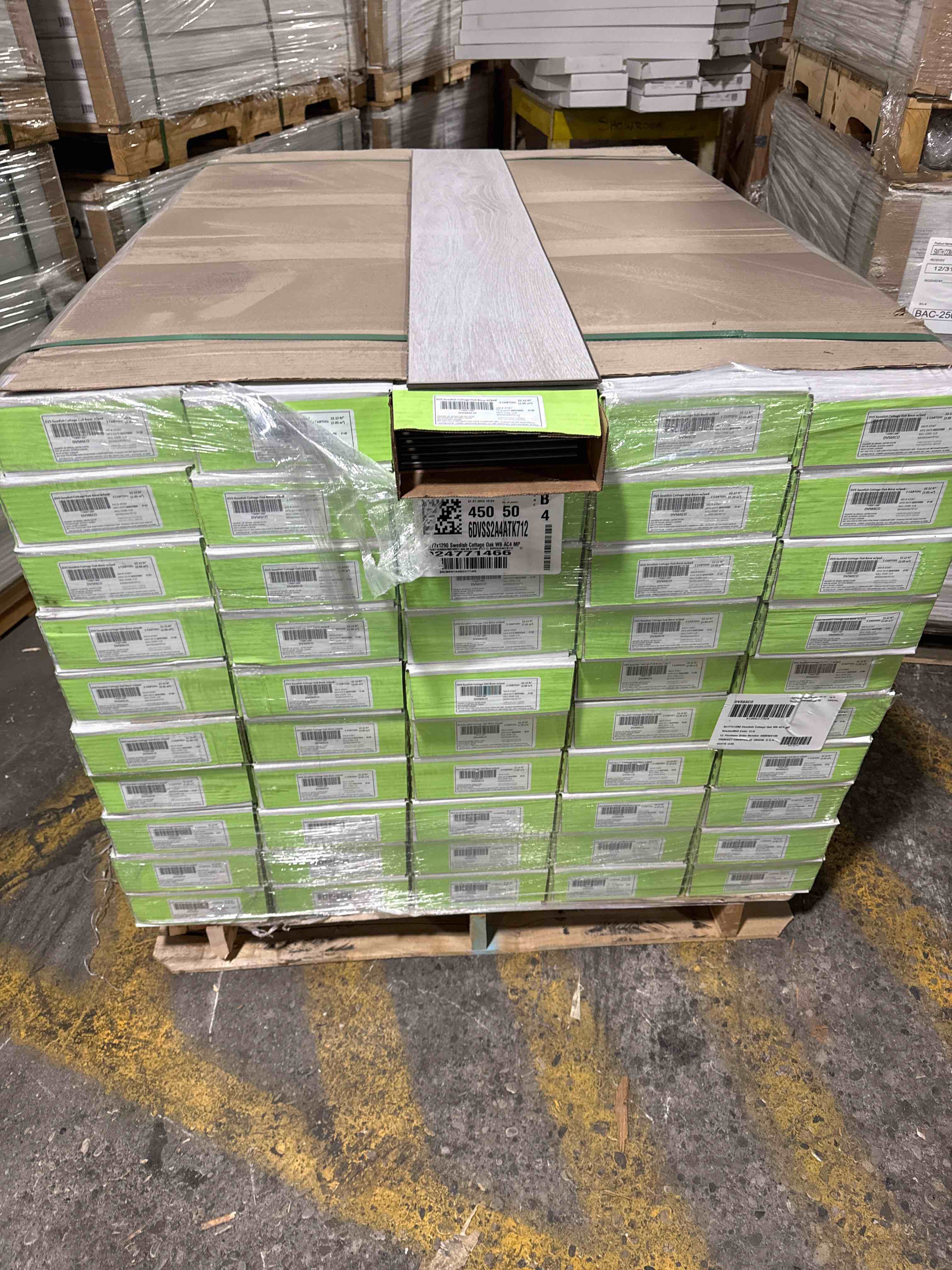 Swedish Cottage Oak 8mm laminate flooring with attached pad (22.12 sq ft/box) 50 boxes -bid per sq ft 