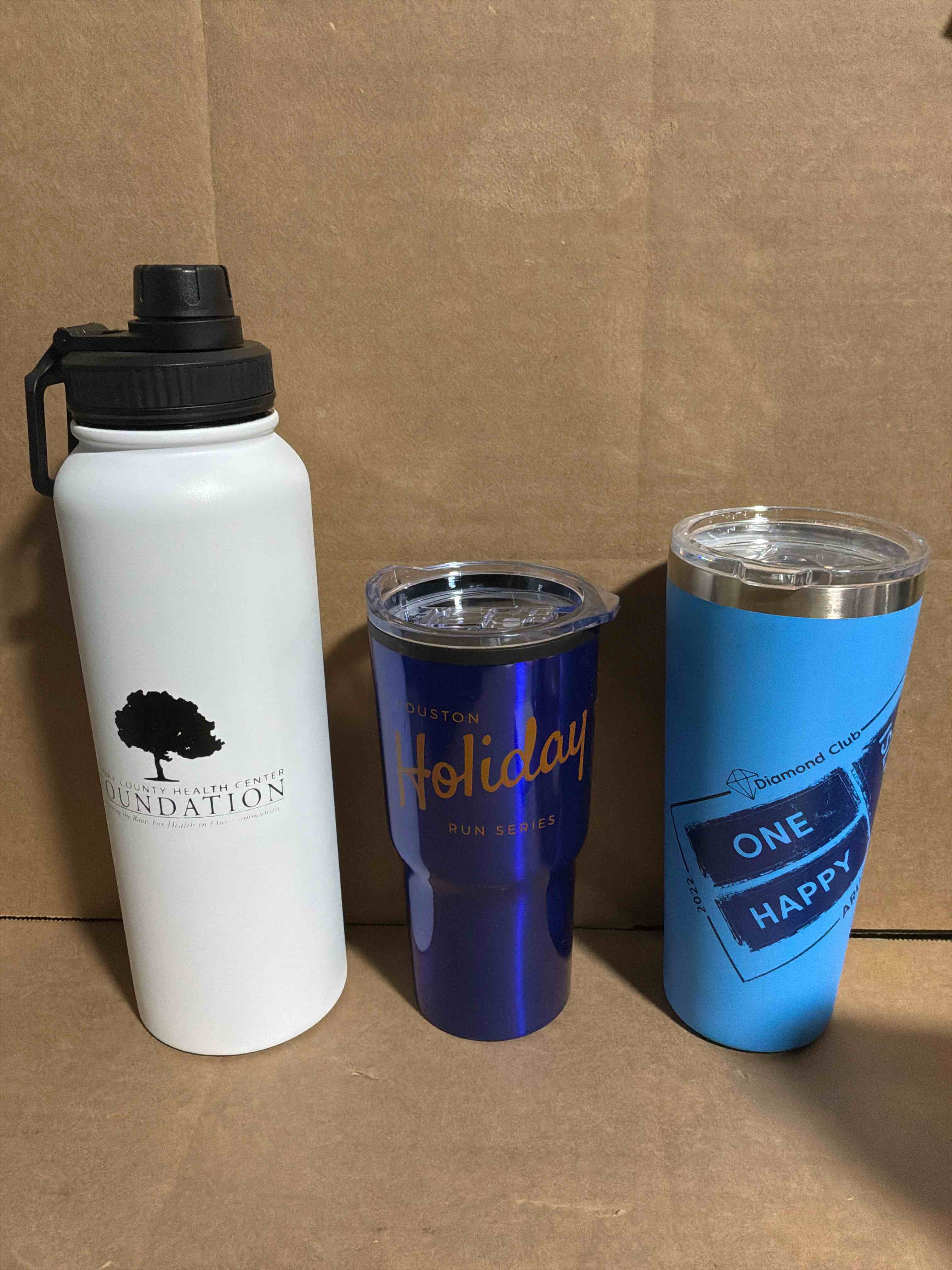 Condition photo showing New/Like New for four pack of assorted stainless steel tumblers