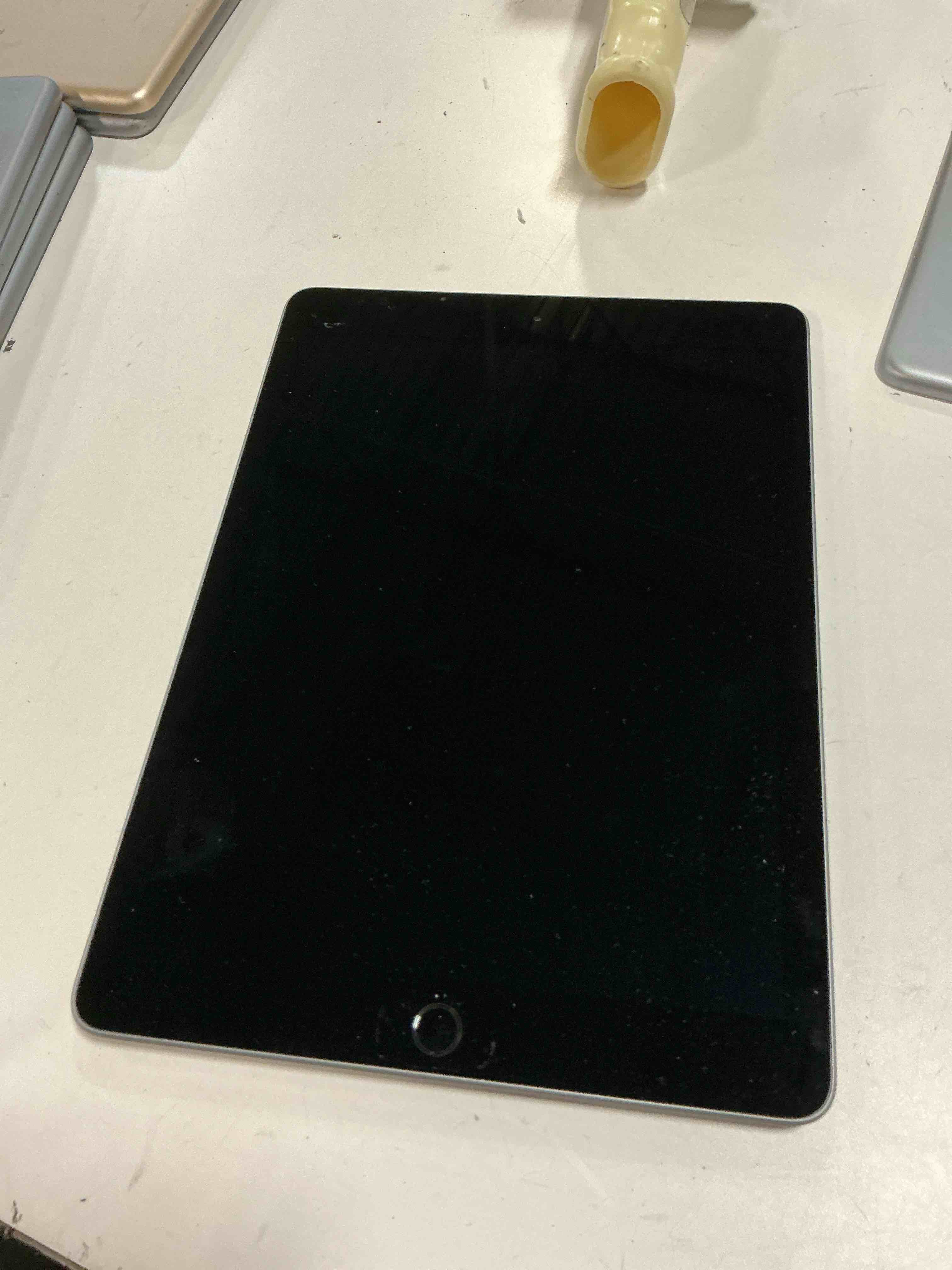 Condition photo showing As Is for Apple iPad 6th Generation A1893 128GB Wi-Fi 9.7in iOS 15 Space Gray - 