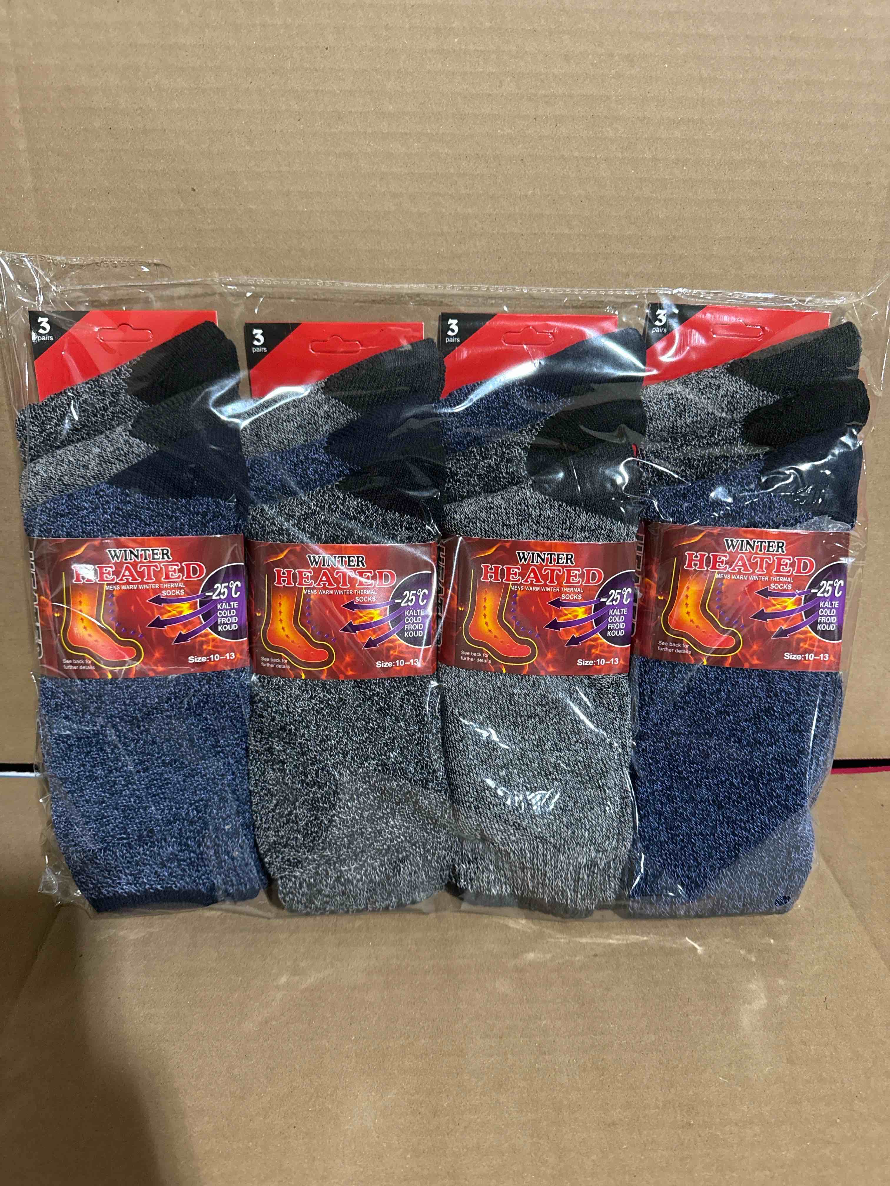 Condition photo showing Brand New for 12 pairs of men’s winter heated socks size 10 to 13
