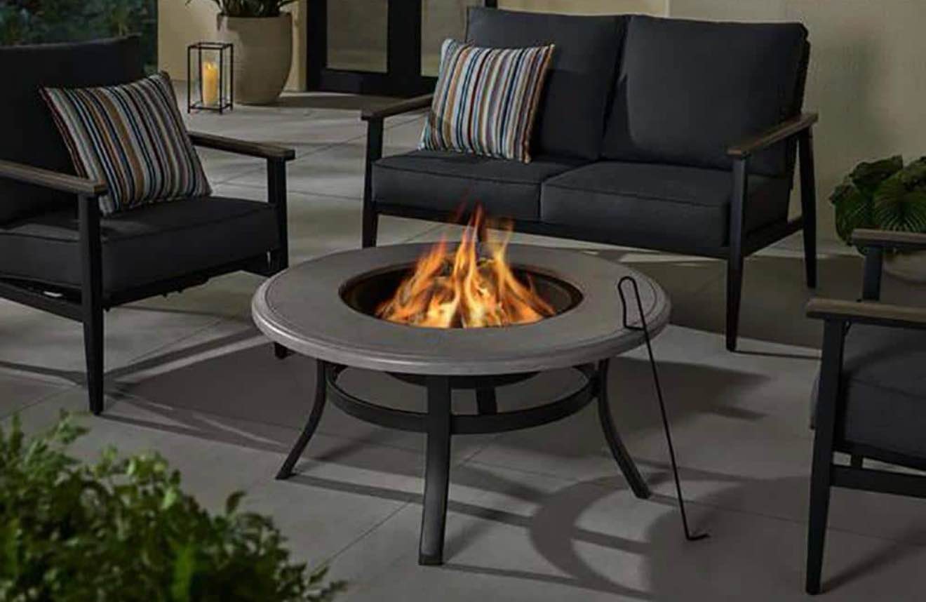 Condition photo showing New/Like New for whitfield 38.00 in. w black/grey steel wood outdoor fire pit with grate, cover, and poker included