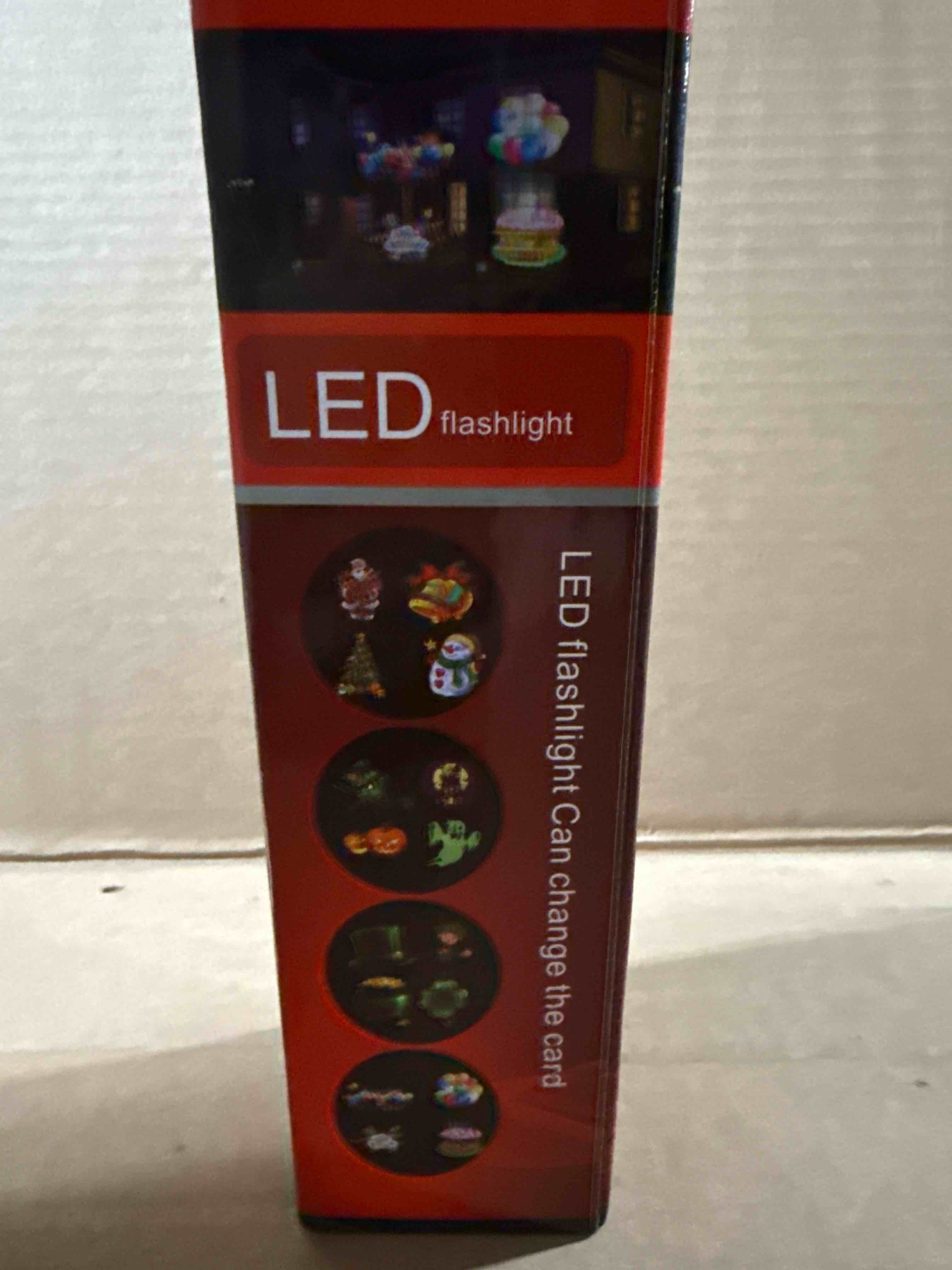 Condition photo showing New/Like New for led flashlight holiday projector 