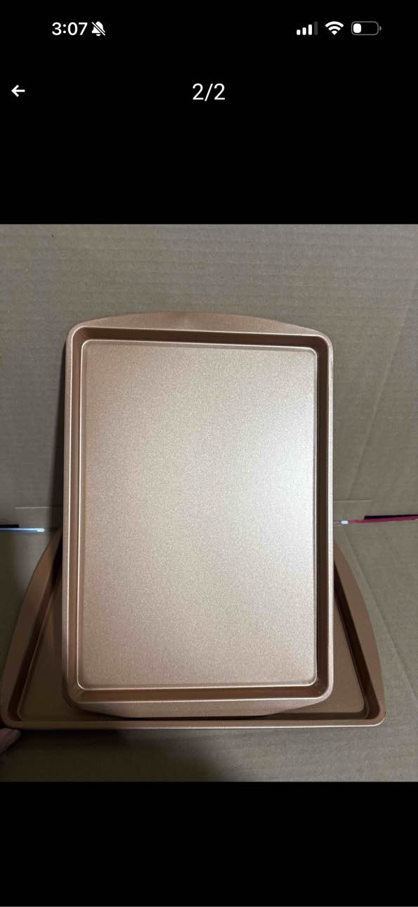 Condition photo showing New/Like New for (set of 2) 15”x9.5” copper cookie sheets 