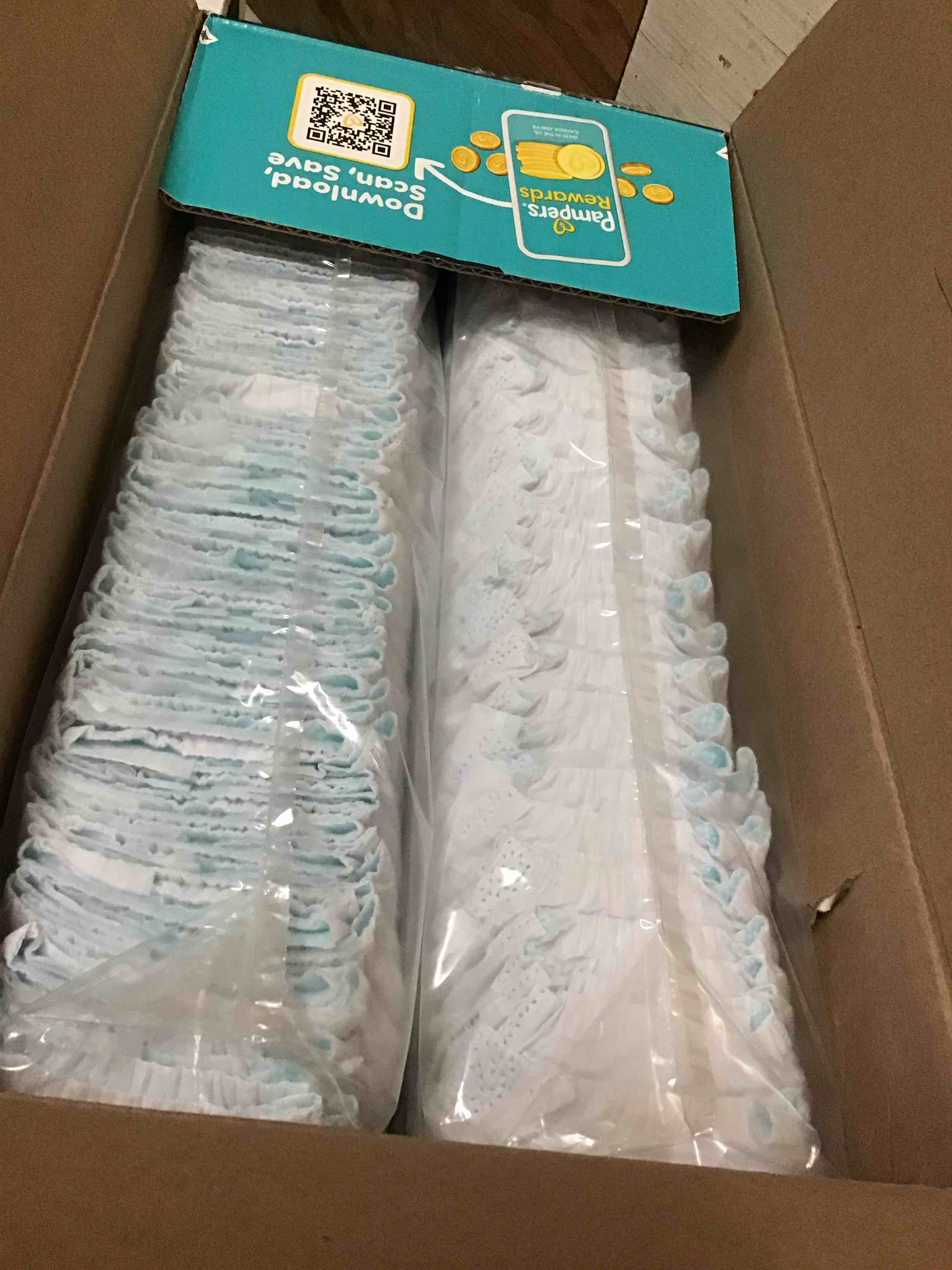 Condition photo showing New/Like New for pampers swaddlers ultra diapers, size 8. 86 count 