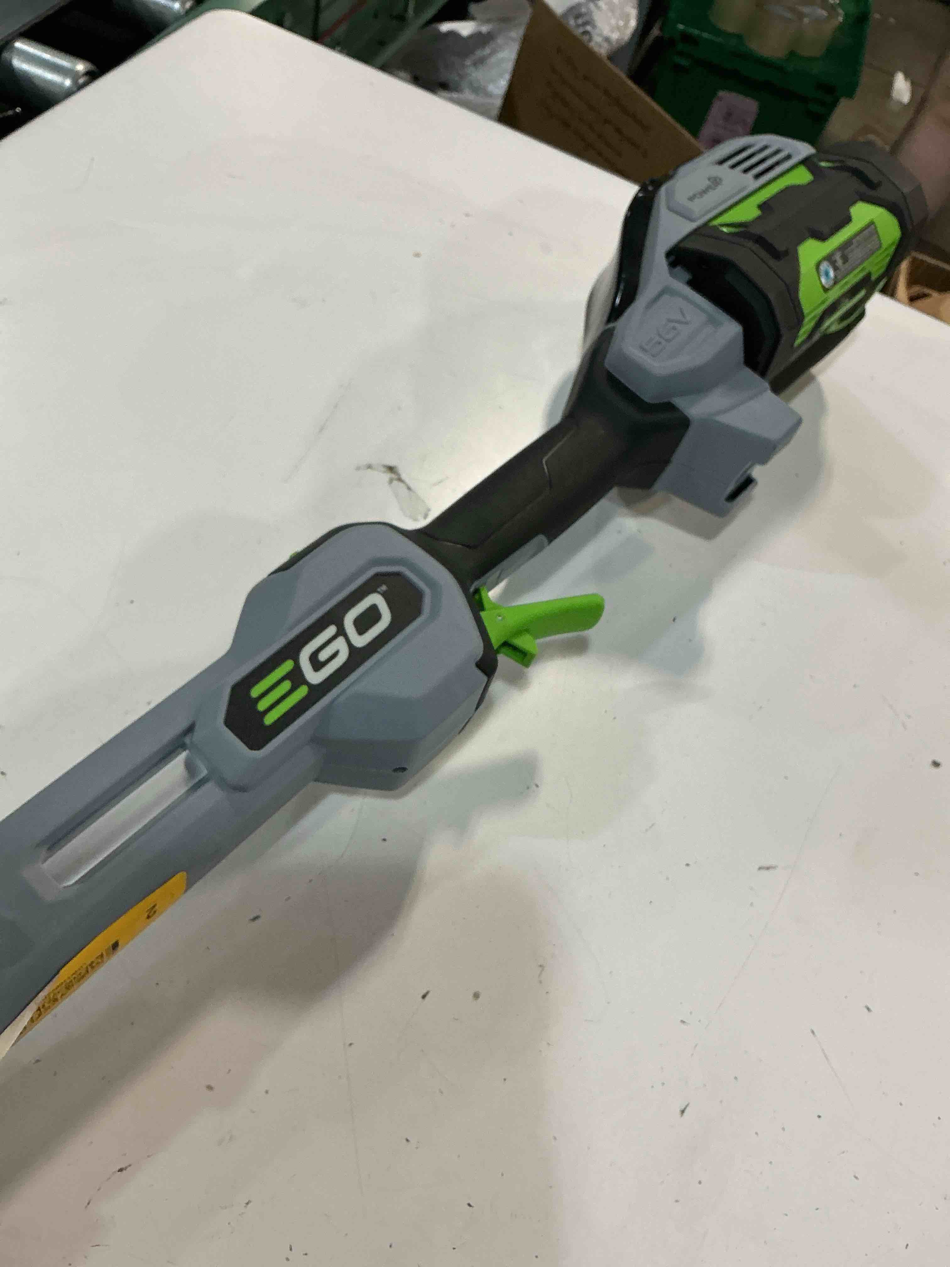 Condition photo showing As Is for ego power+ powerload with carbon fiber shaft 56-volt 16-in telescopic shaft battery string trimmer 2.5 ah (battery included) (charger included)