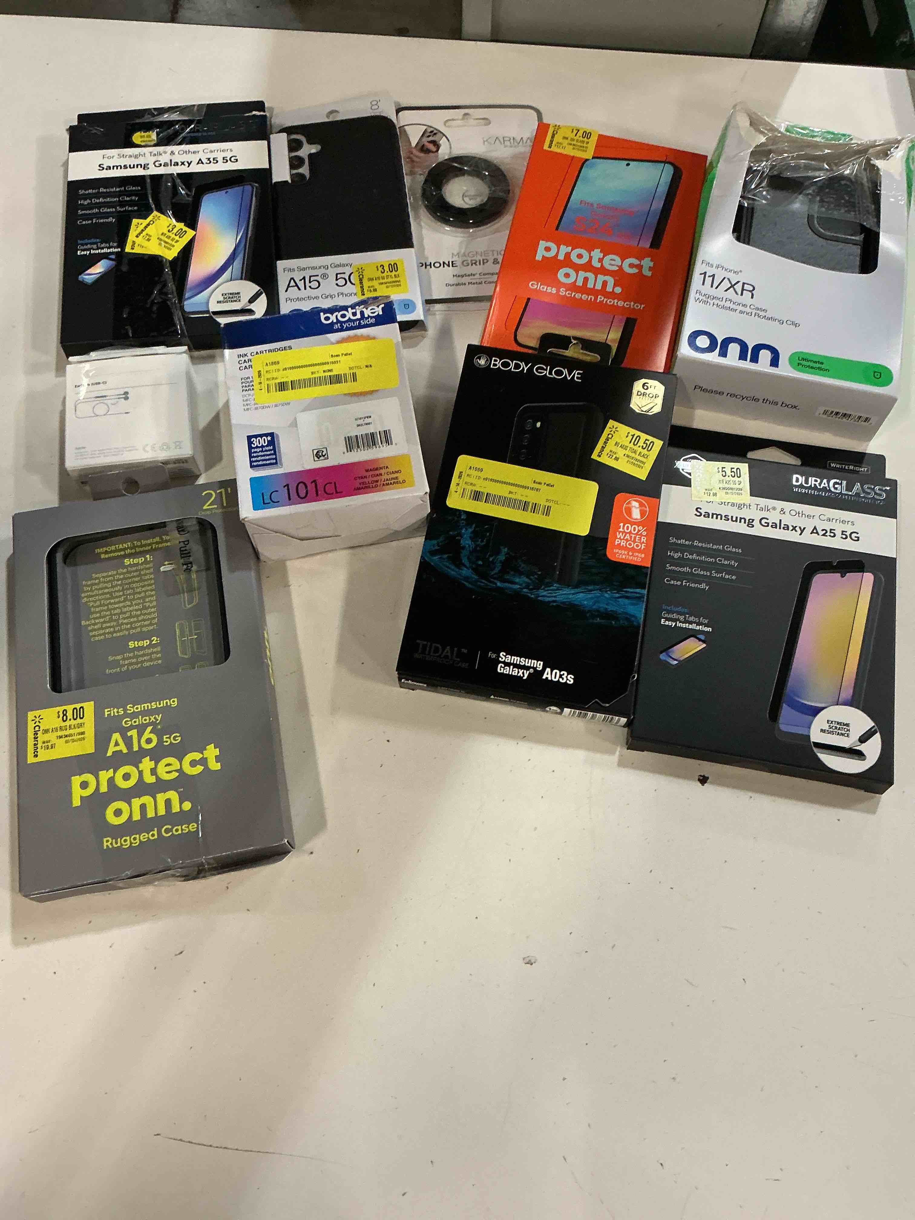 Condition photo showing As Is for assorted lot of electronics (headphones, small gadgets, headsets, etc.)