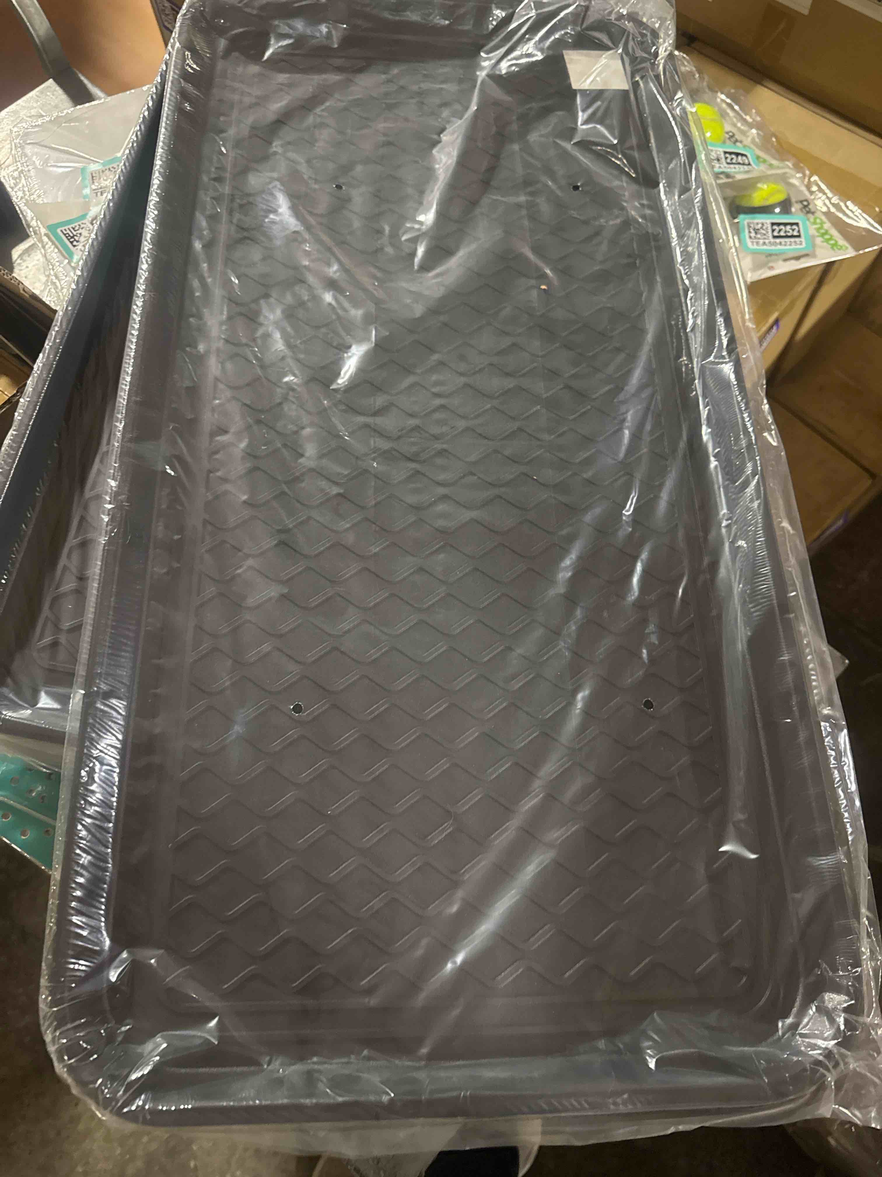 Condition photo showing Brand New for heavy-duty multi-purpose utility tray with raised edges and a non-slip textured surface designed to contain spills and keep items secure.