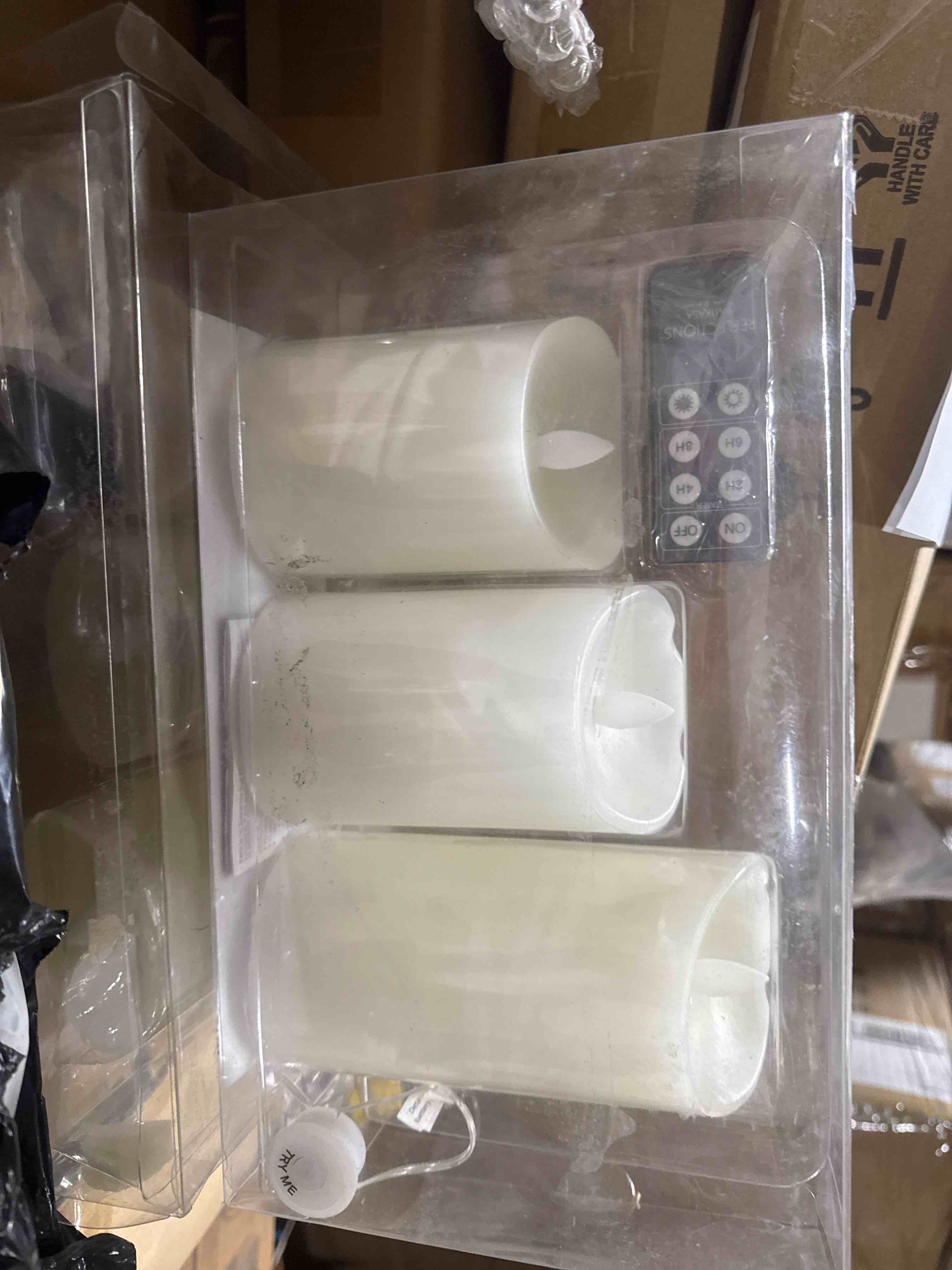 Condition photo showing Good Condition for flameless set of 3 melted edge pillar led candles with remote