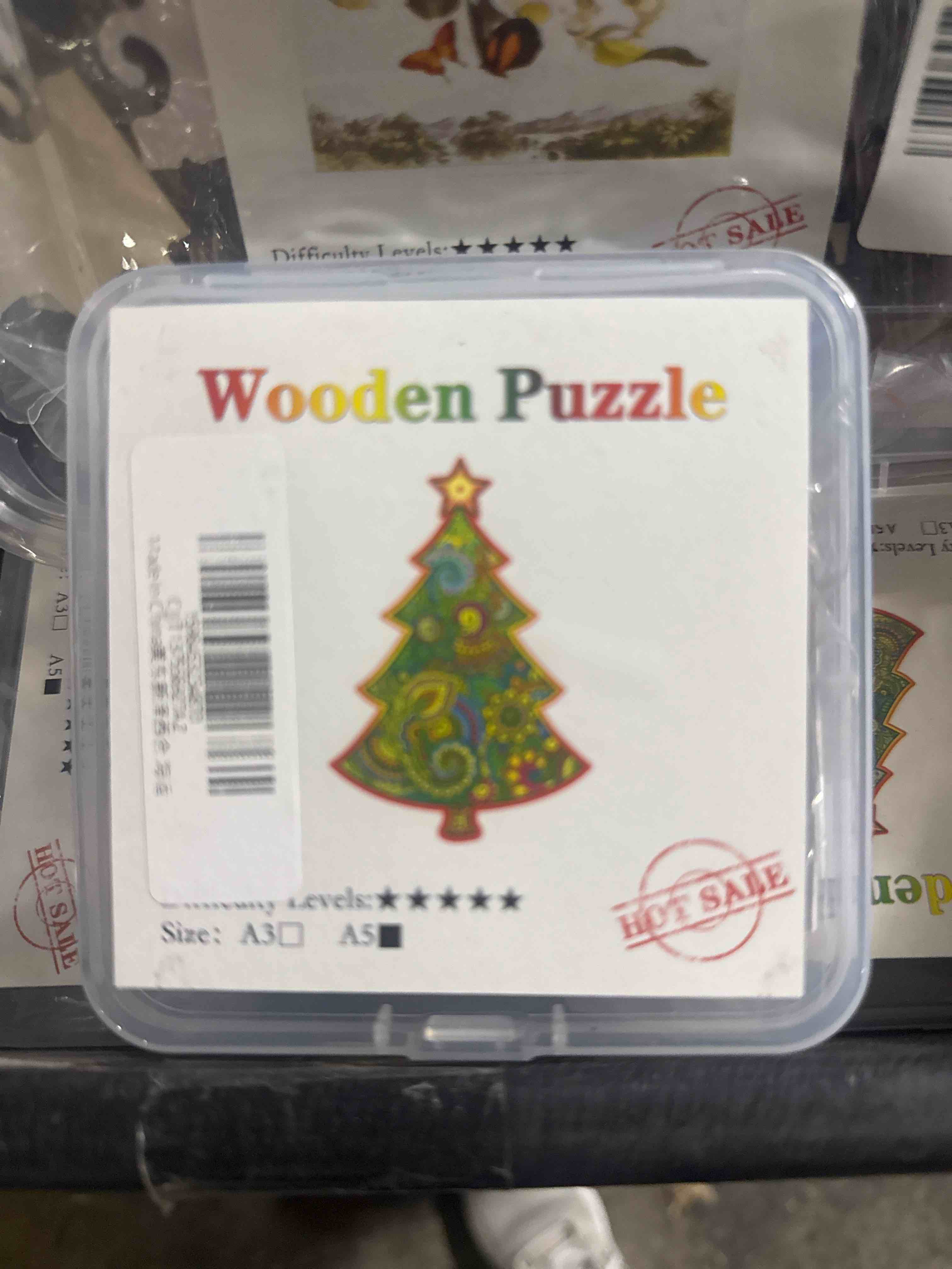Condition photo showing New/Like New for small wooden puzzle - christmas tree 
