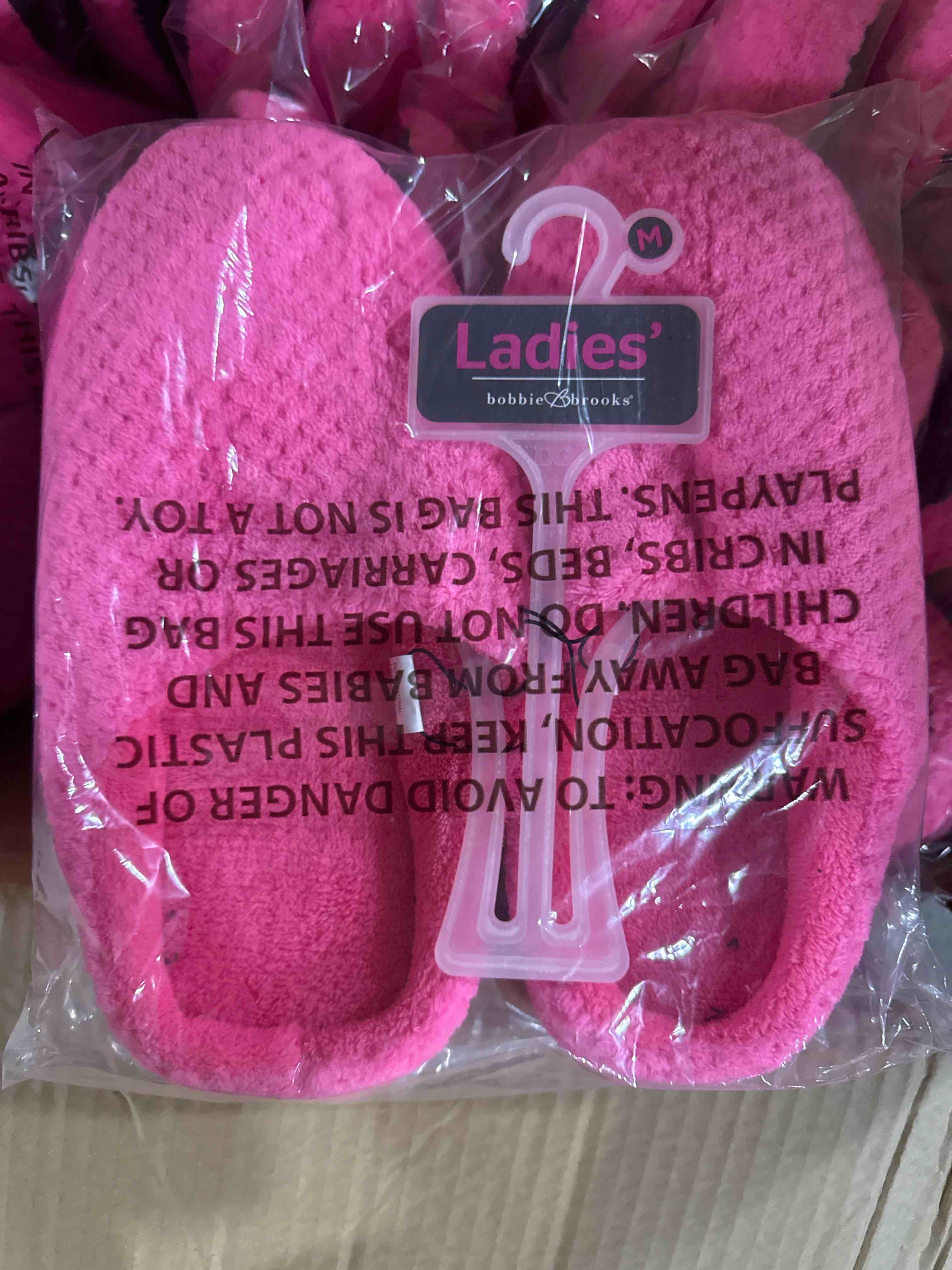 Condition photo showing Brand New for ladies pink slippers size medium 