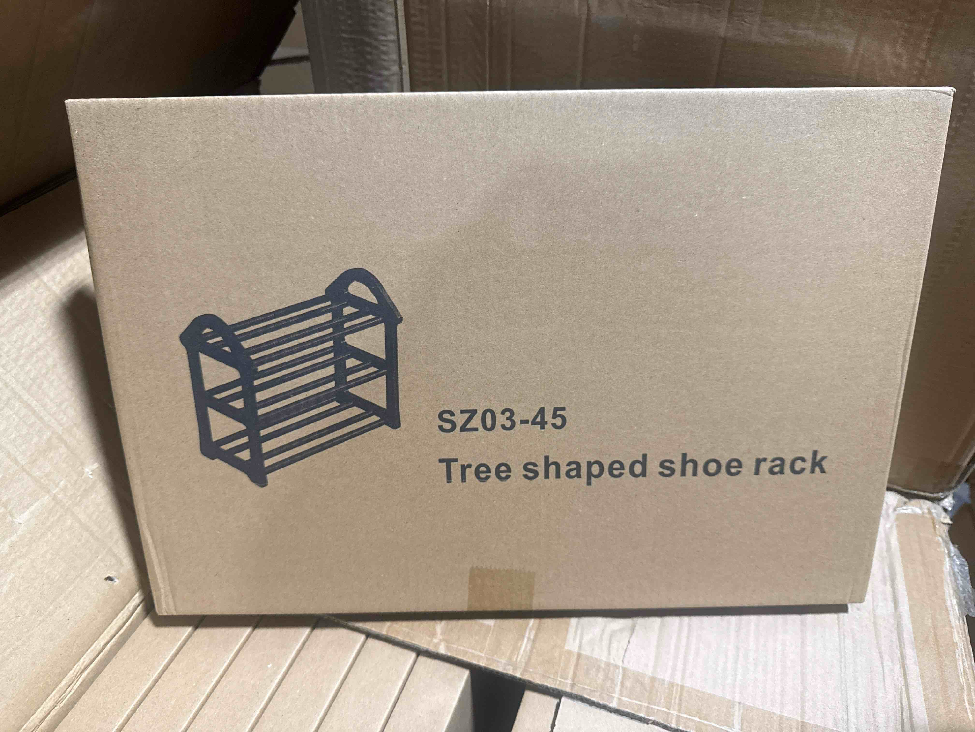 Condition photo showing New/Like New for tree shaped shoe rack black 