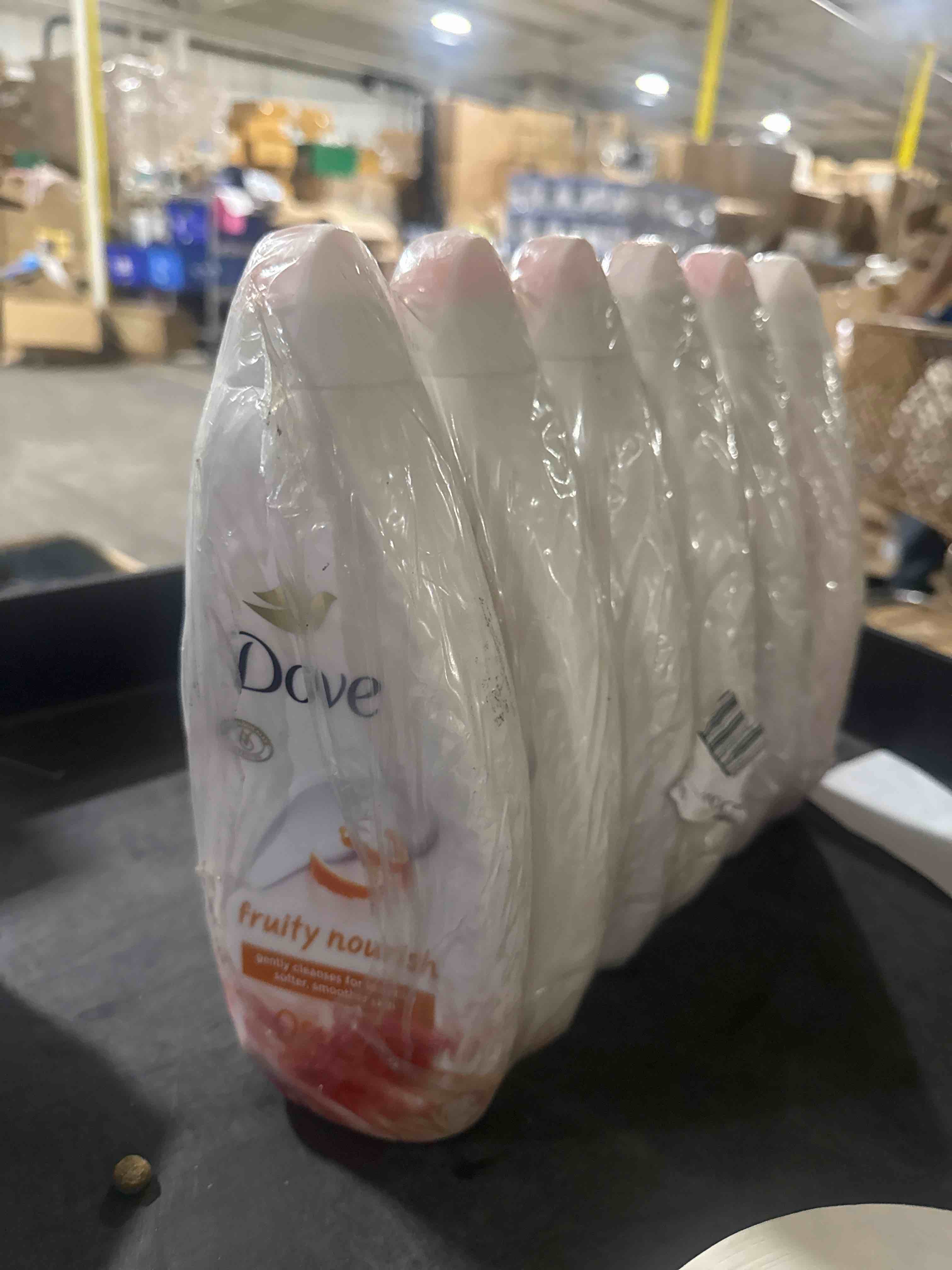 Condition photo showing As Is for pack of 6 dove shower gel 