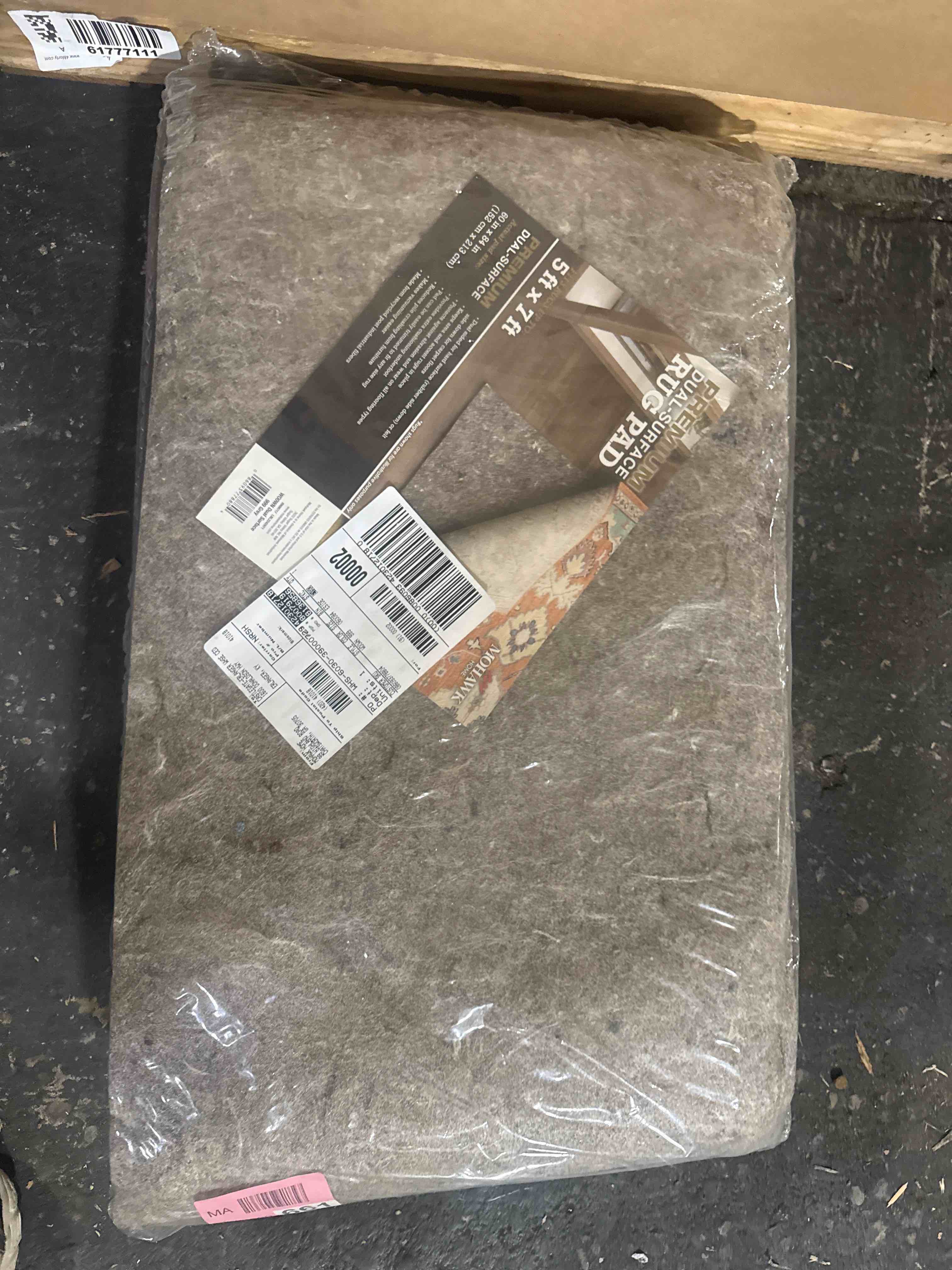 Condition photo showing New/Like New for premium dual surface rug pad 5ft x 7ft