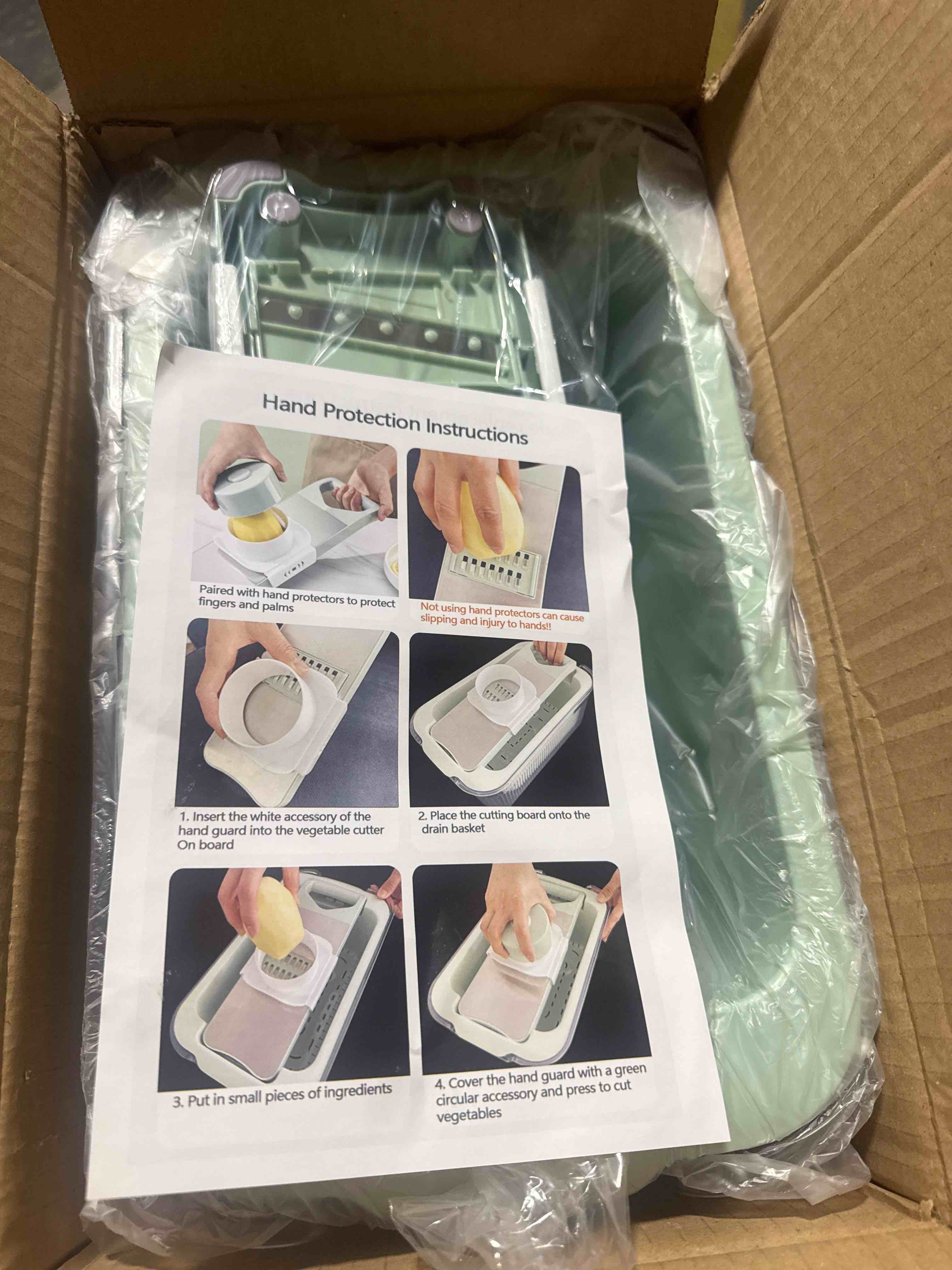 Condition photo showing New/Like New for mandoline slicer with container, adjustable vegetable chopper and grater, stainless steel kitchen tool
