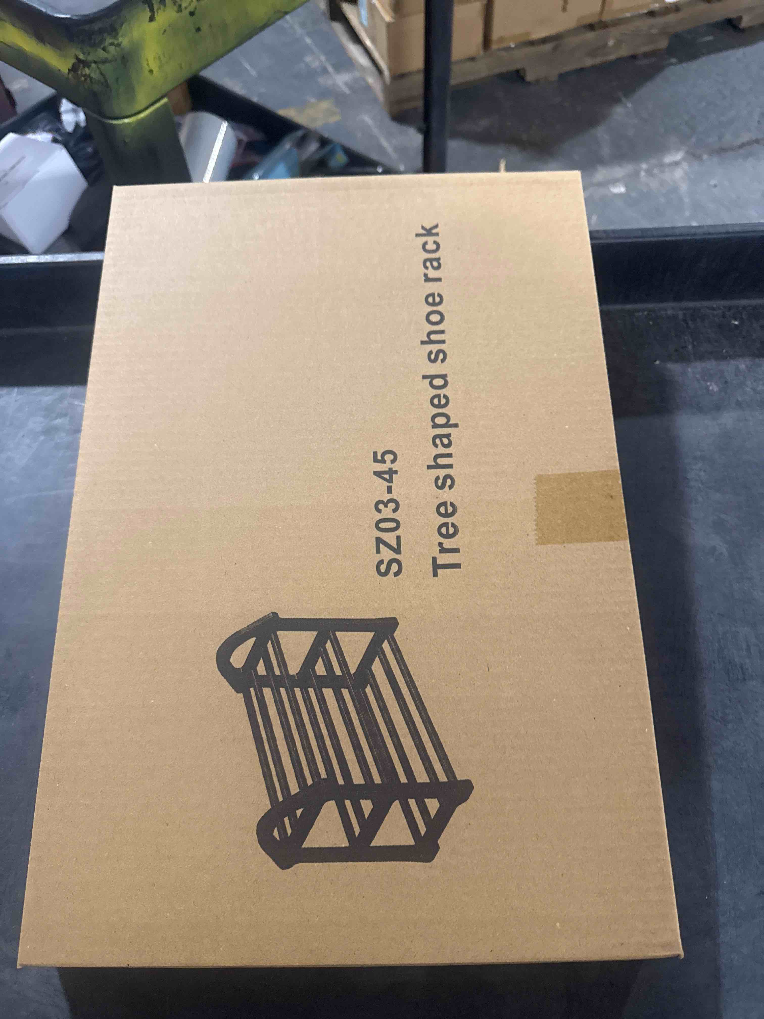 Condition photo showing New/Like New for tree shaped shoe rack black 