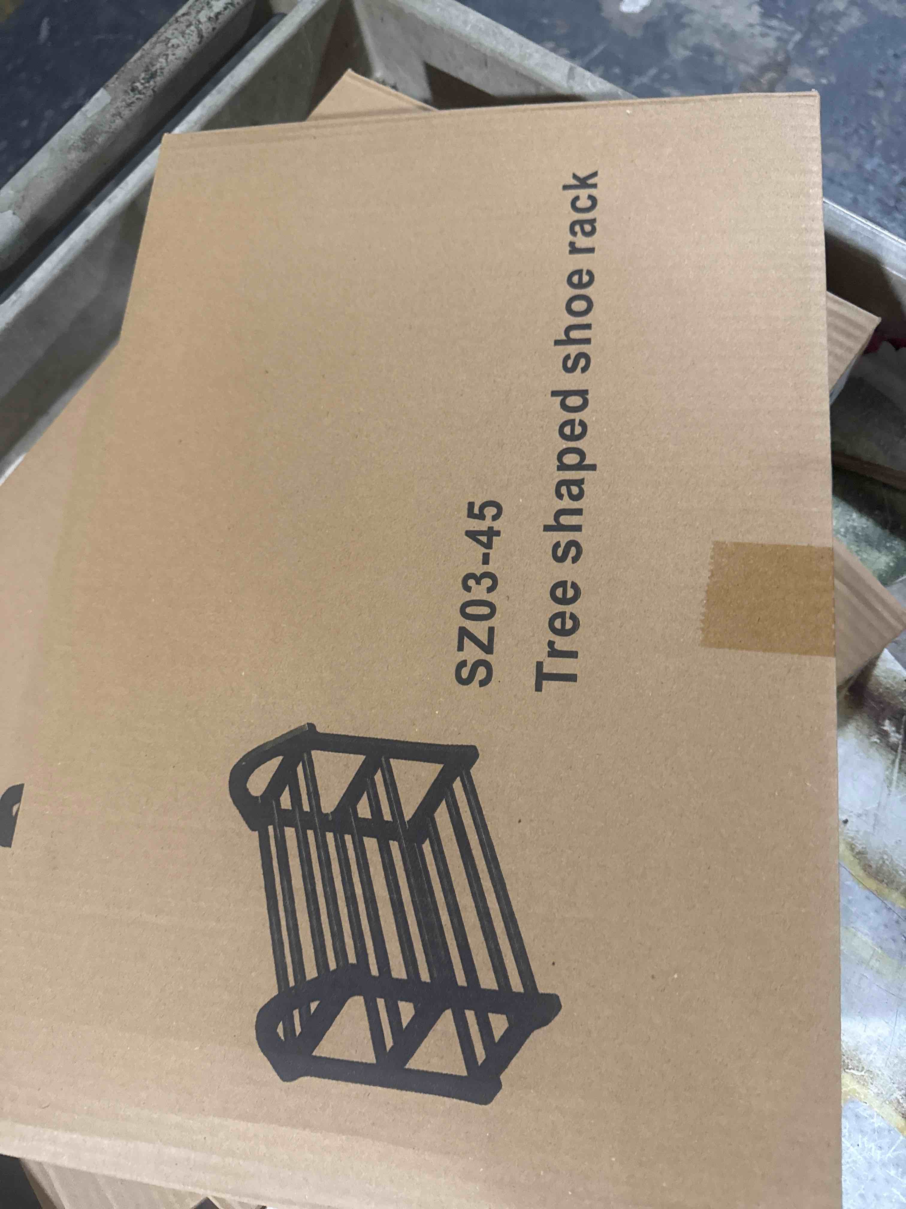 Condition photo showing New/Like New for tree shaped shoe rack black 