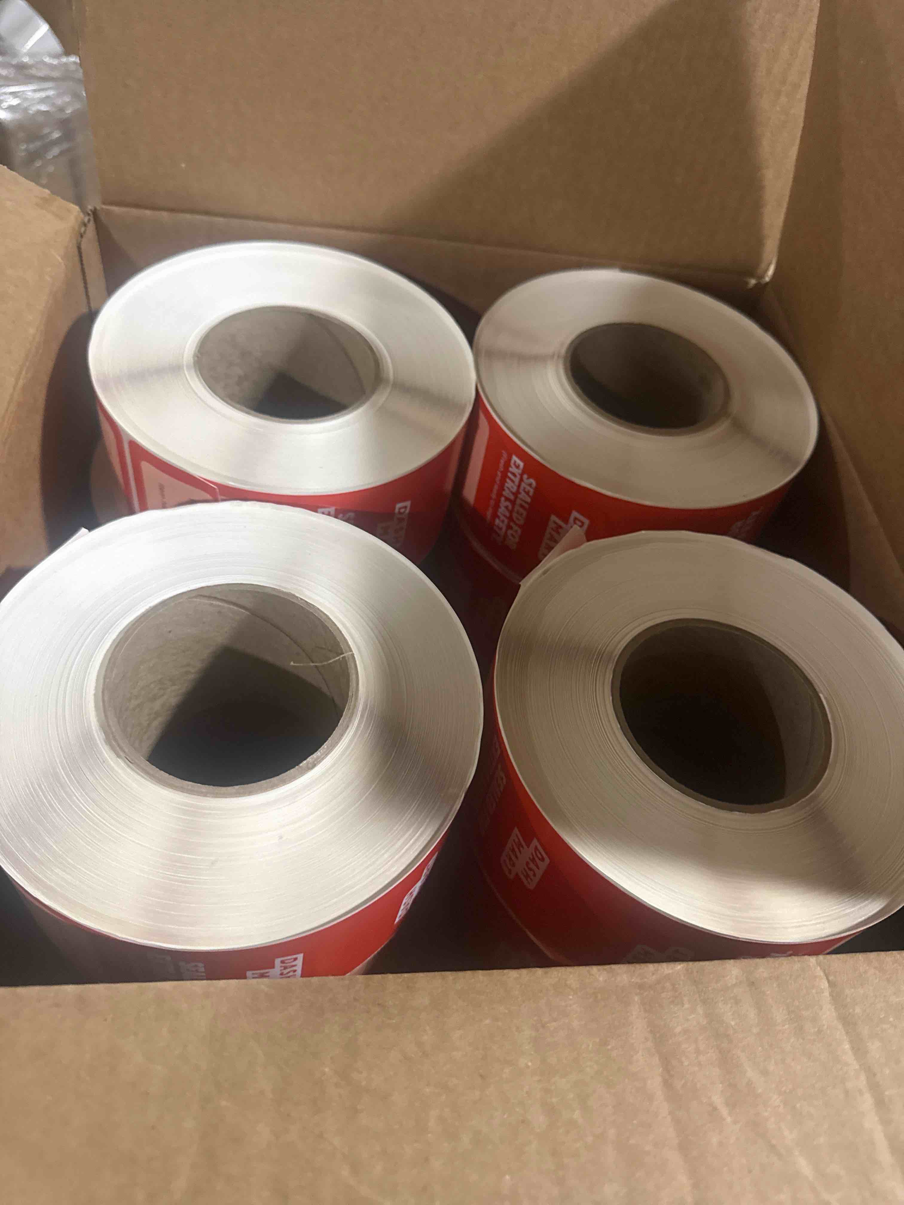 Condition photo showing New/Like New for case of 8 logo bag seal stickers (sealed for extra safety)  