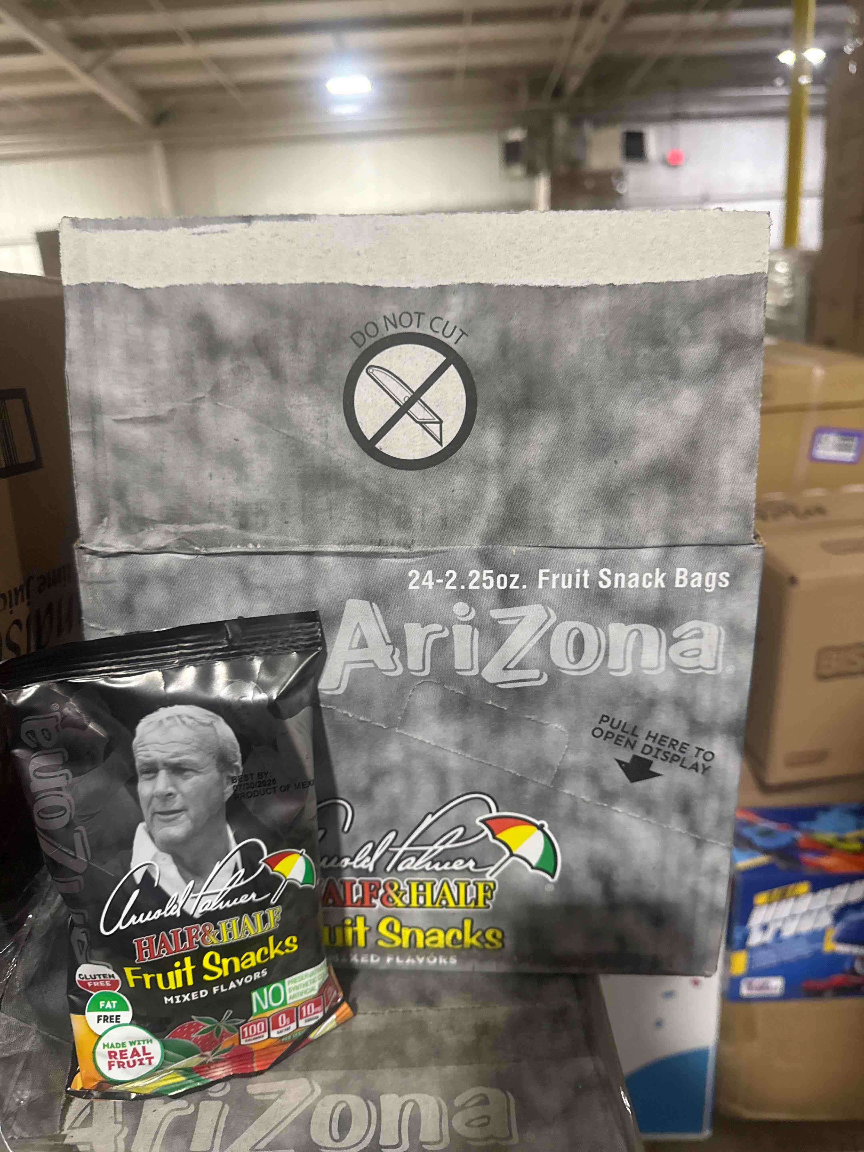 Condition photo showing New/Like New for case of 24 arizona fruit snacks, arnold palmer gluten free gummy chews, 2.25 ounce individual single serve bags bb june 30 2025