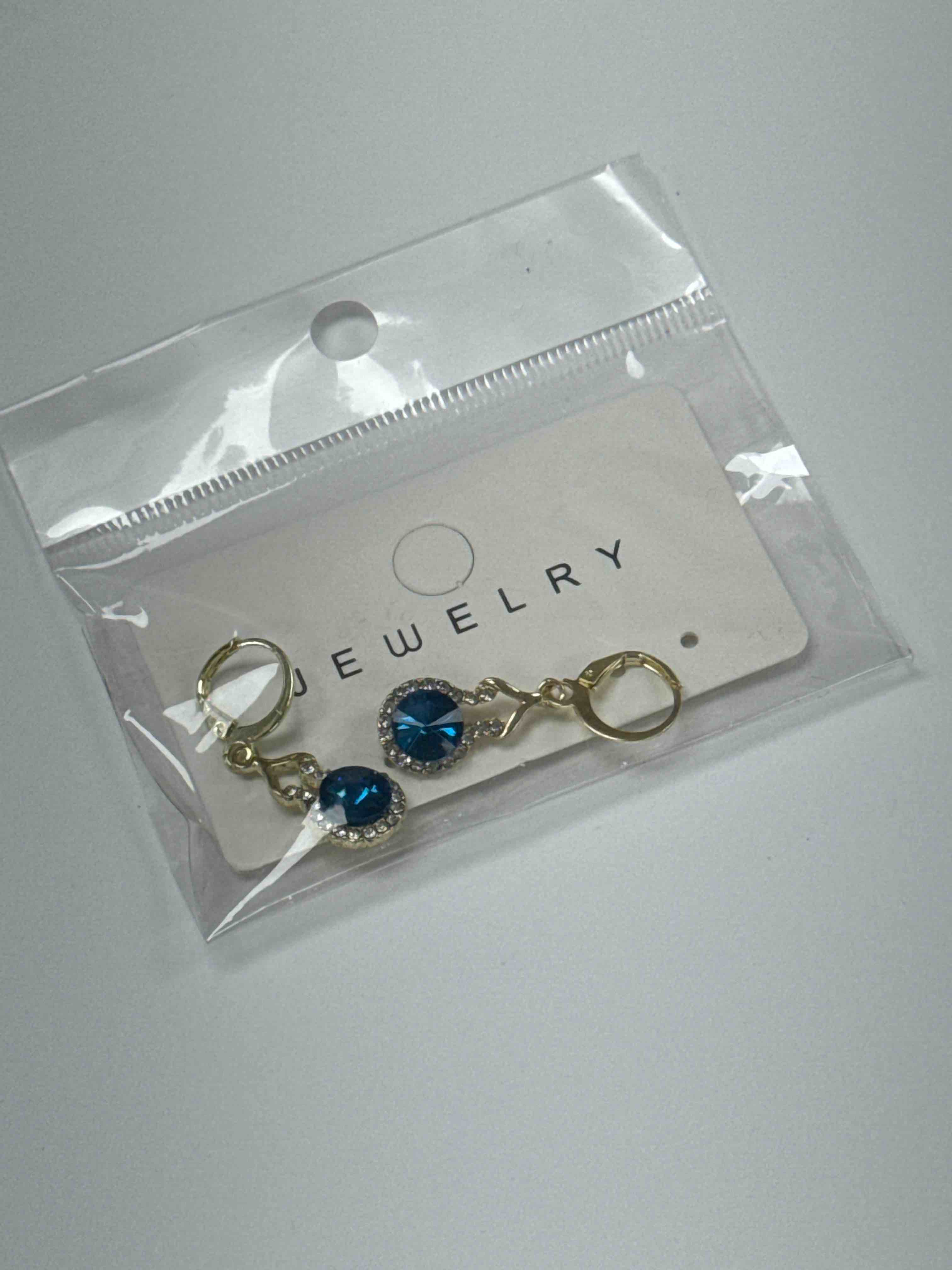 Condition photo showing New/Like New for blue crystal halo drop earrings