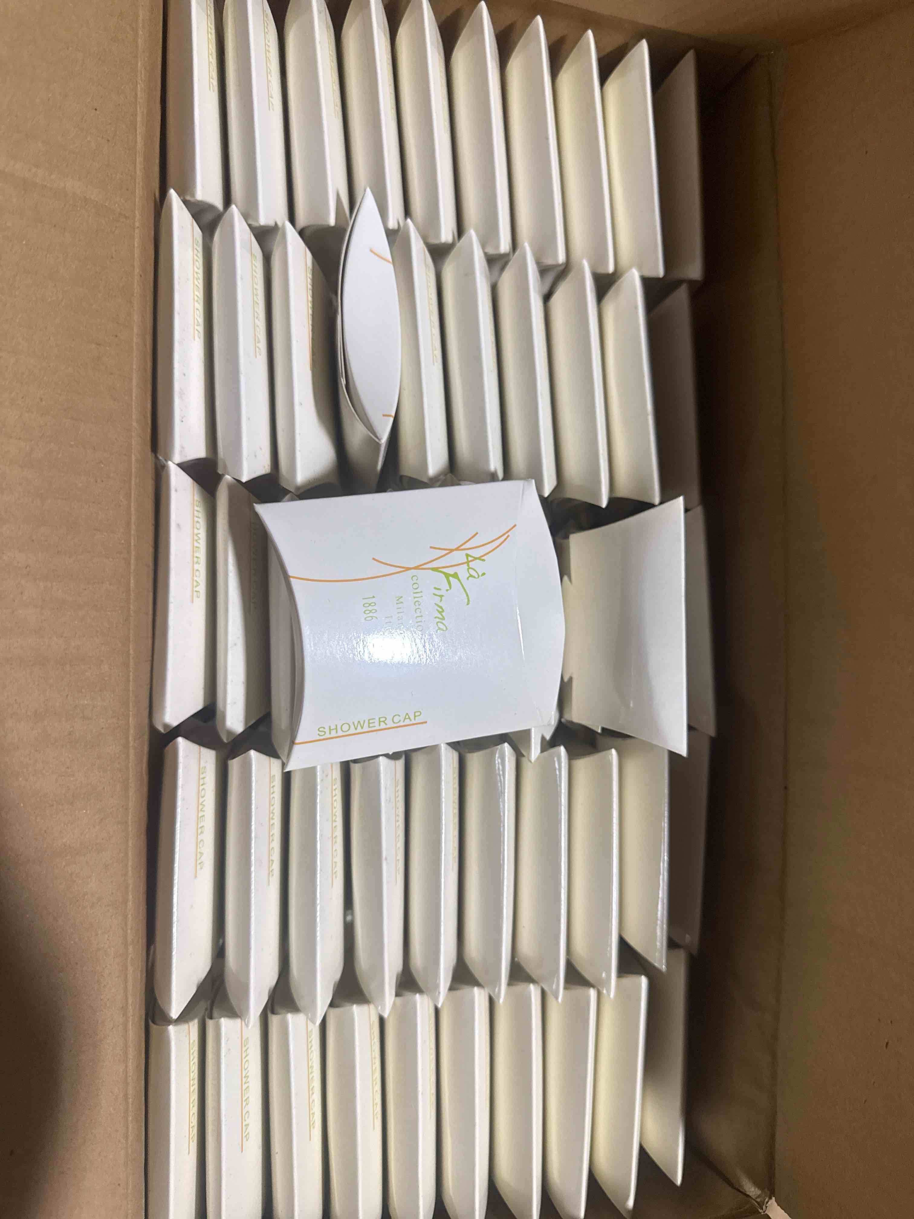 Condition photo showing New/Like New for case of 125 la firma collection shower cap  