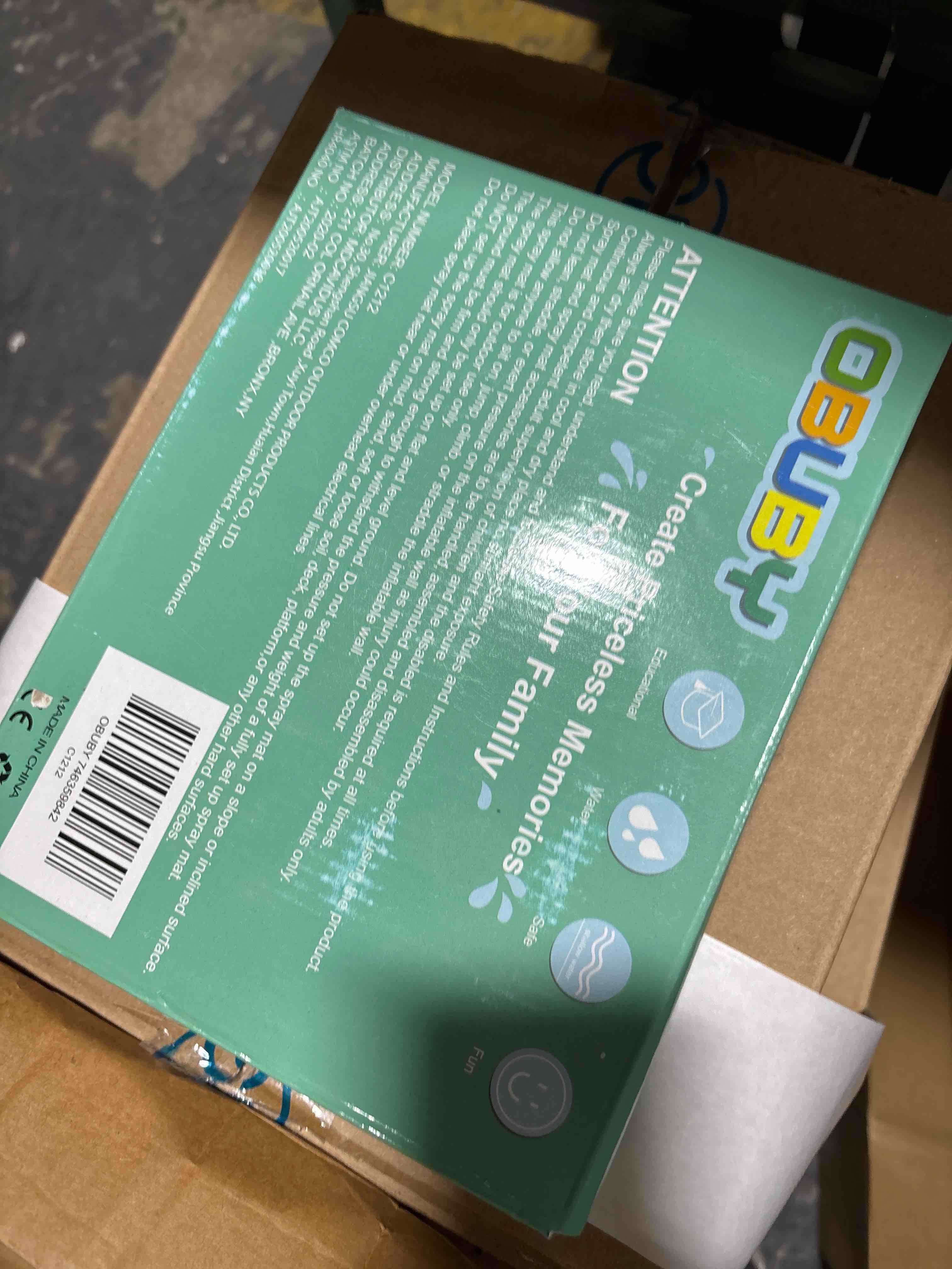 Condition photo showing New/Like New for obuby sprinkler play mat 