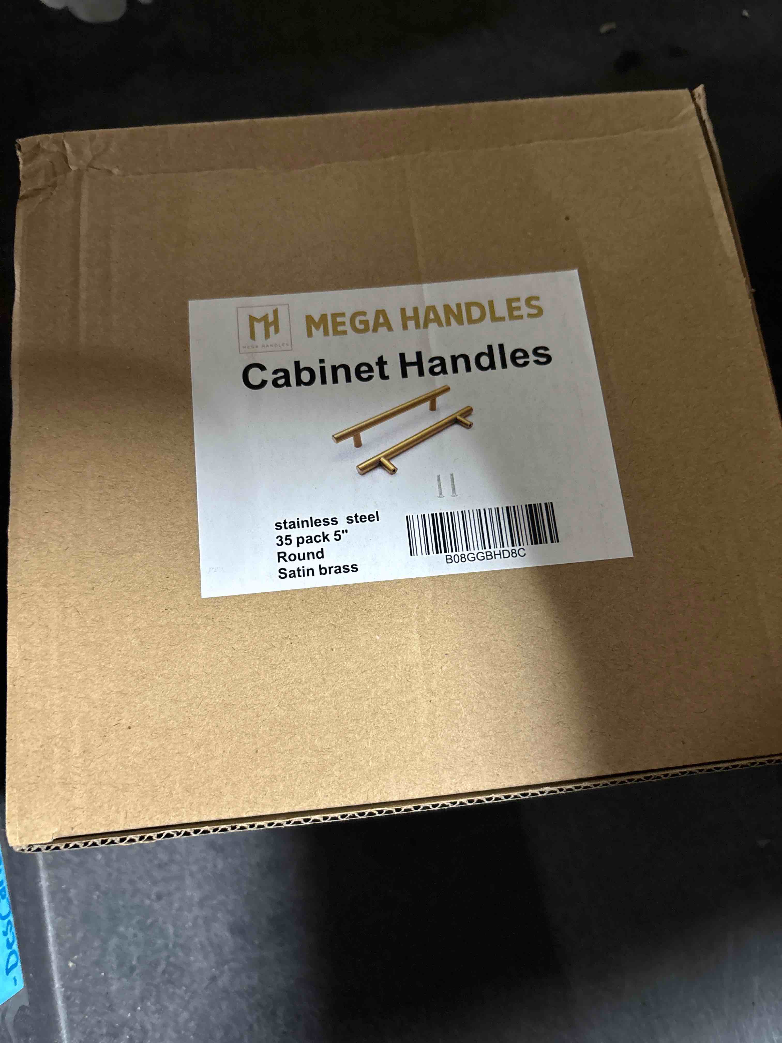 Condition photo showing New/Like New for mega handles cabinet pulls / 5 inch / 35 pack / satin brass