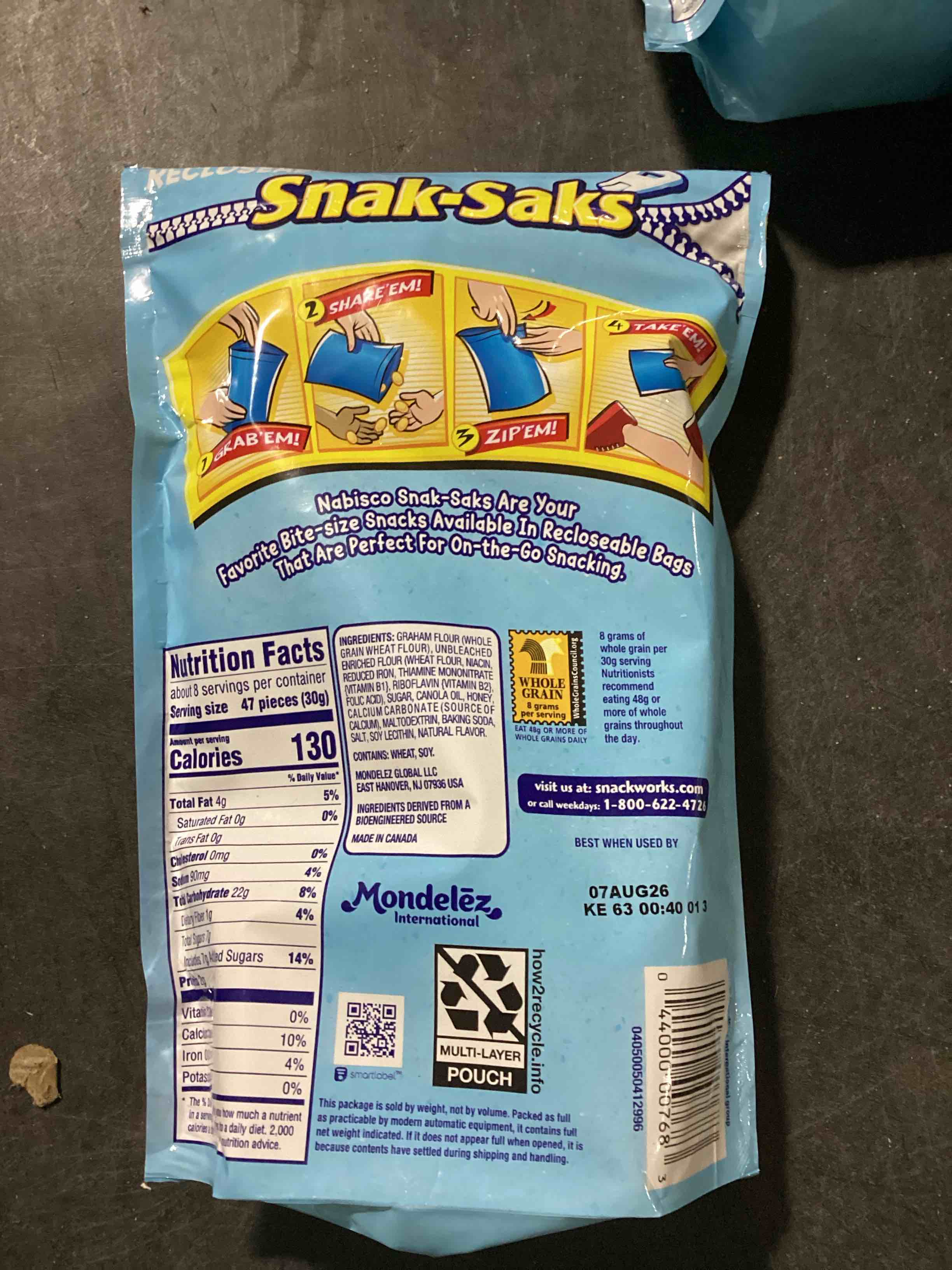 Condition photo showing New/Like New for teddy grahams mini honey graham snacks, kids snacks, 8 oz (bb 8/7/26)