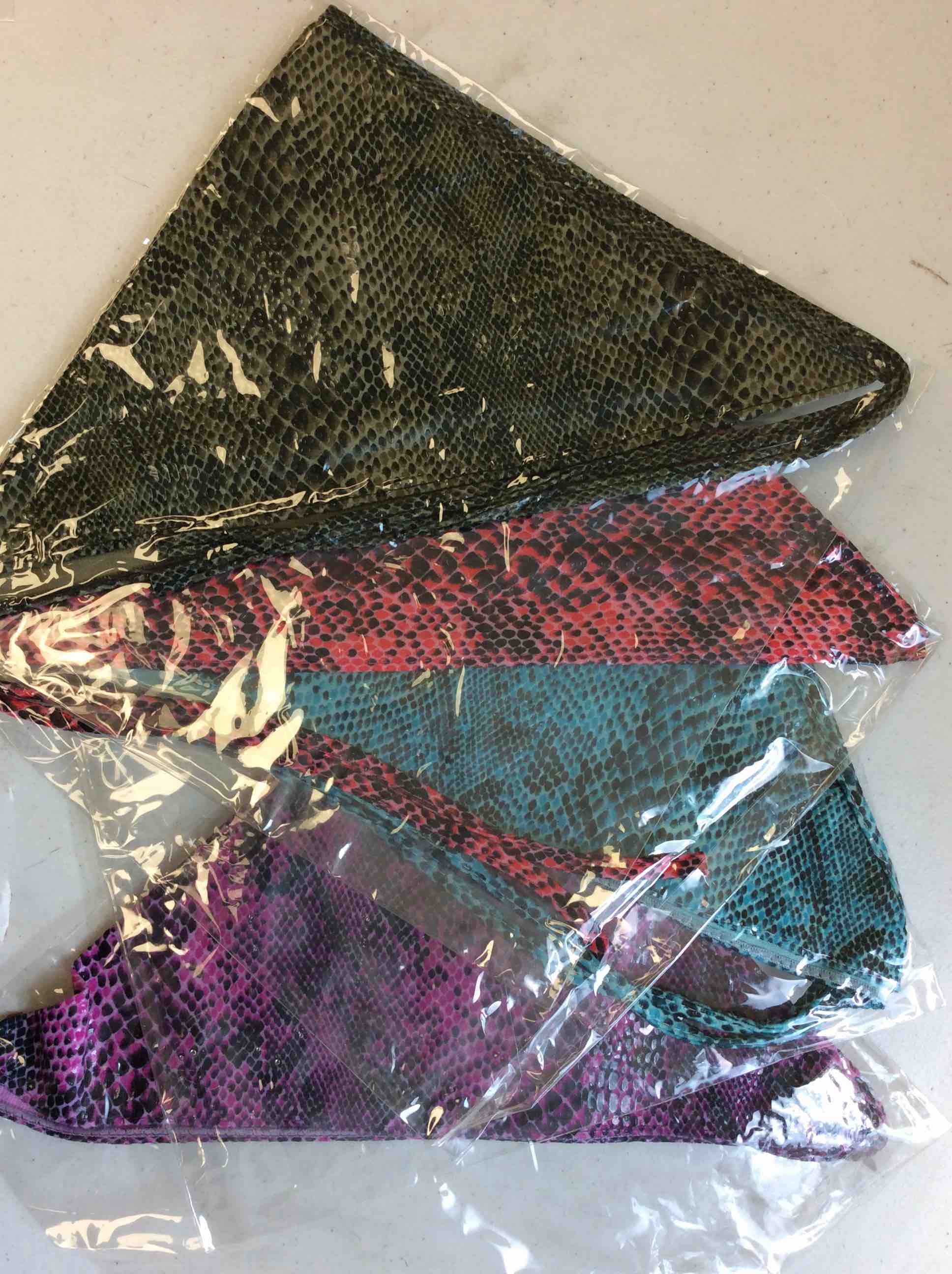 Condition photo showing New/Like New for snake print bandanna 