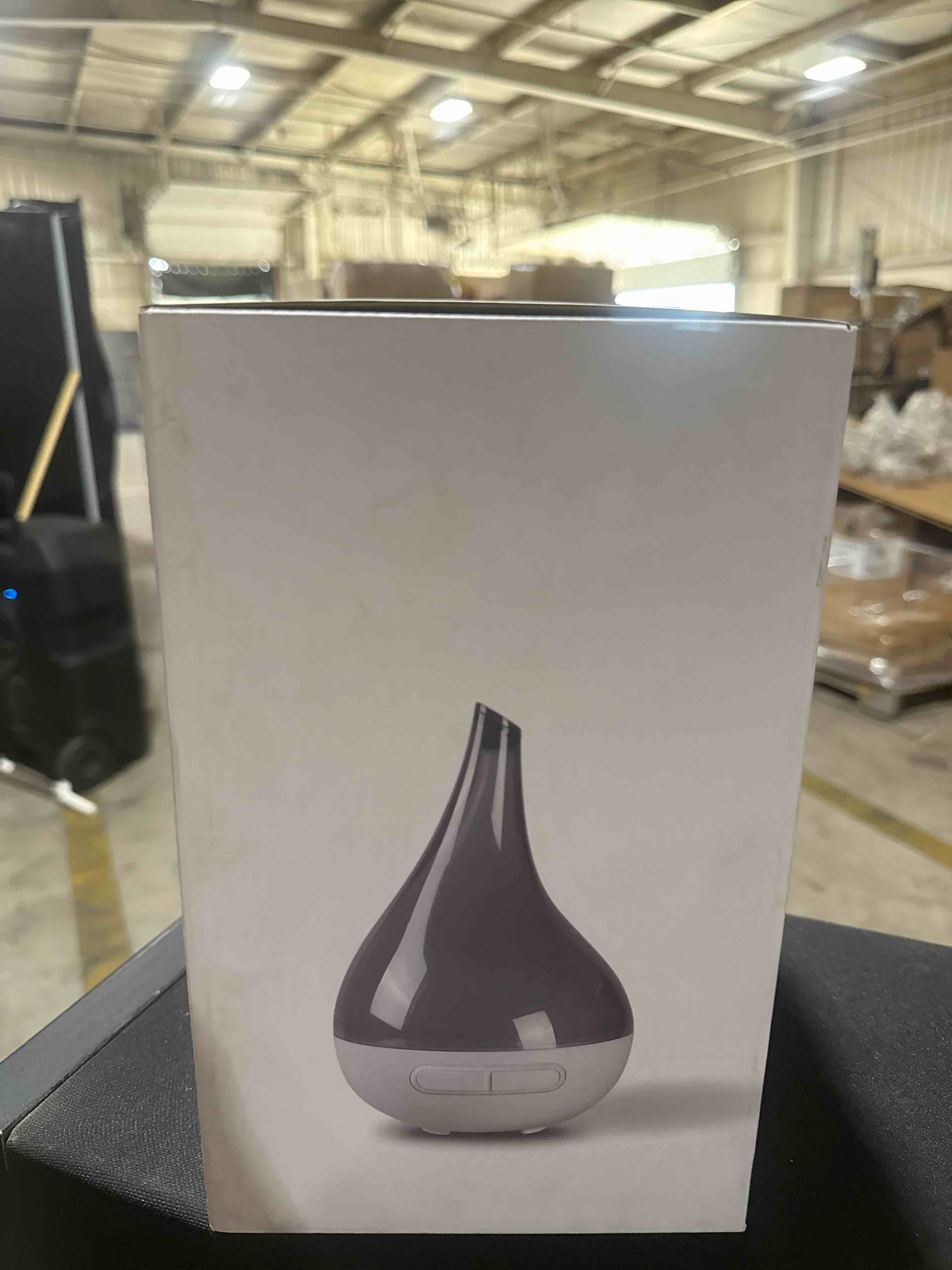 Condition photo showing New/Like New for humidew aroma ultrasonic humidifer